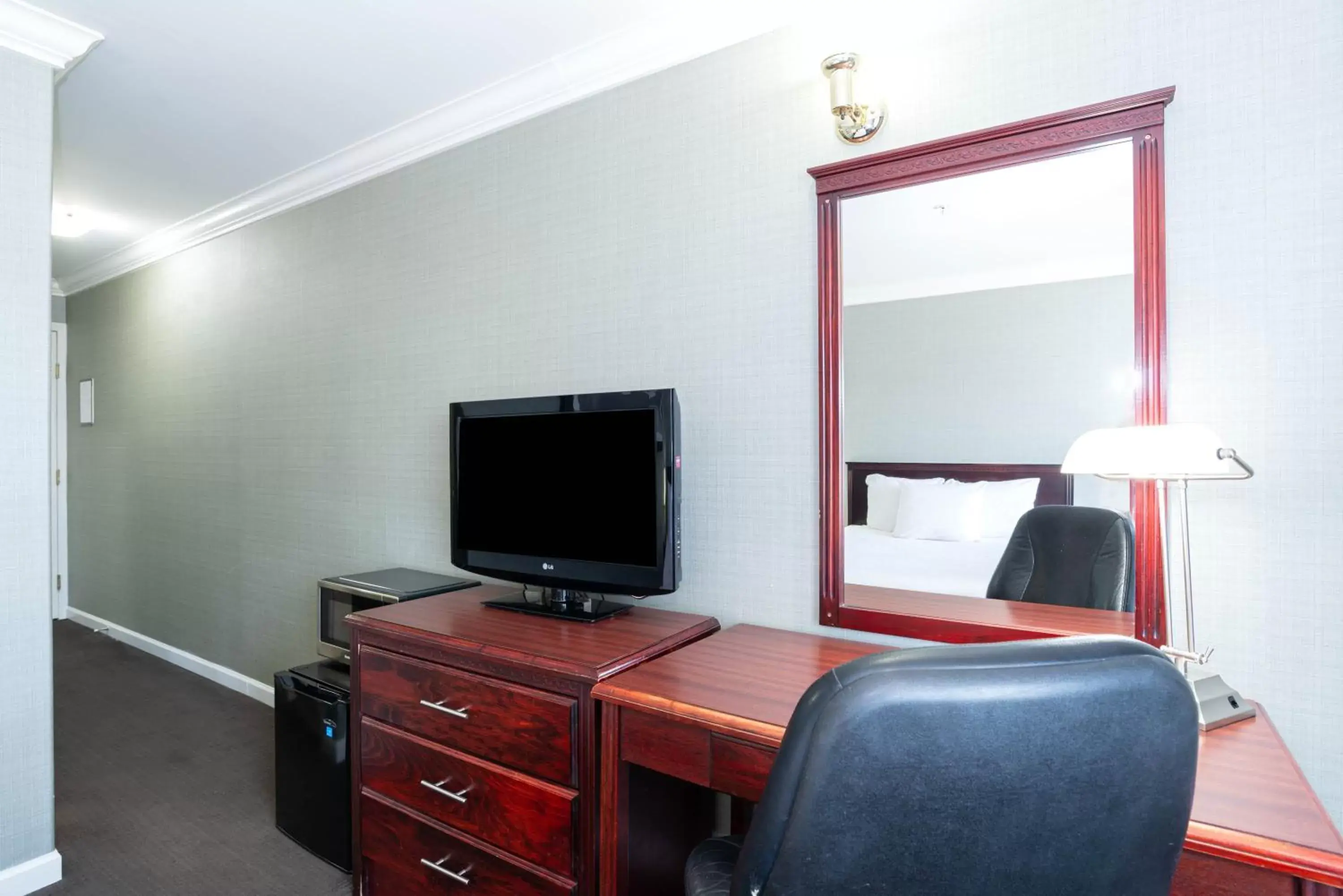 Photo of the whole room, TV/Entertainment Center in Sandman Hotel Red Deer