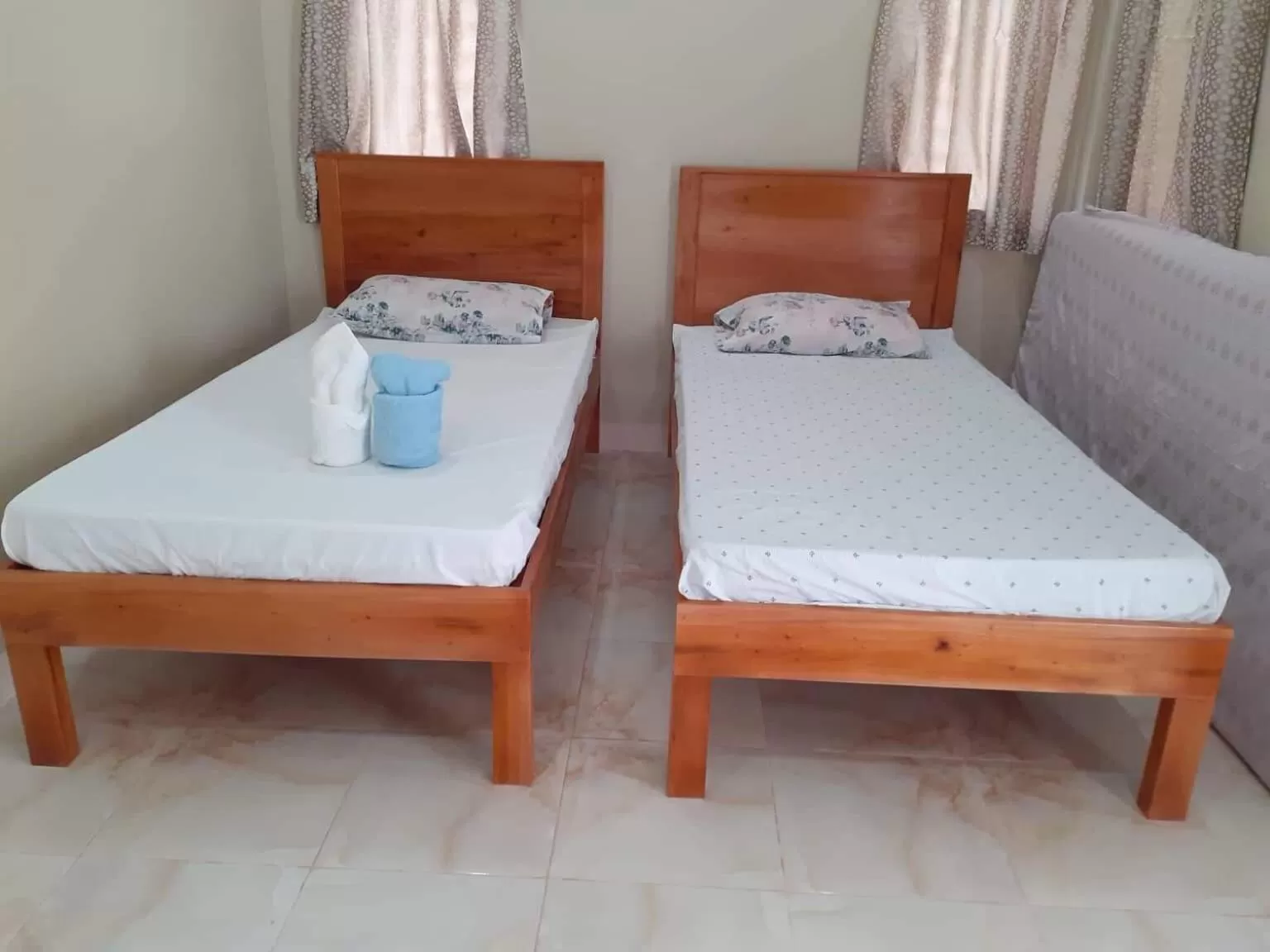 Bed in D's Oceanview Beach Resort