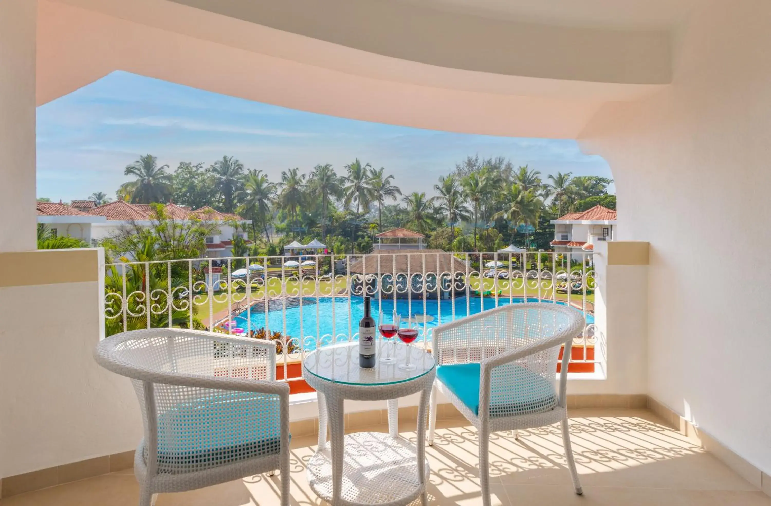 Balcony/Terrace, Pool View in Heritage Village Resort & Spa Goa