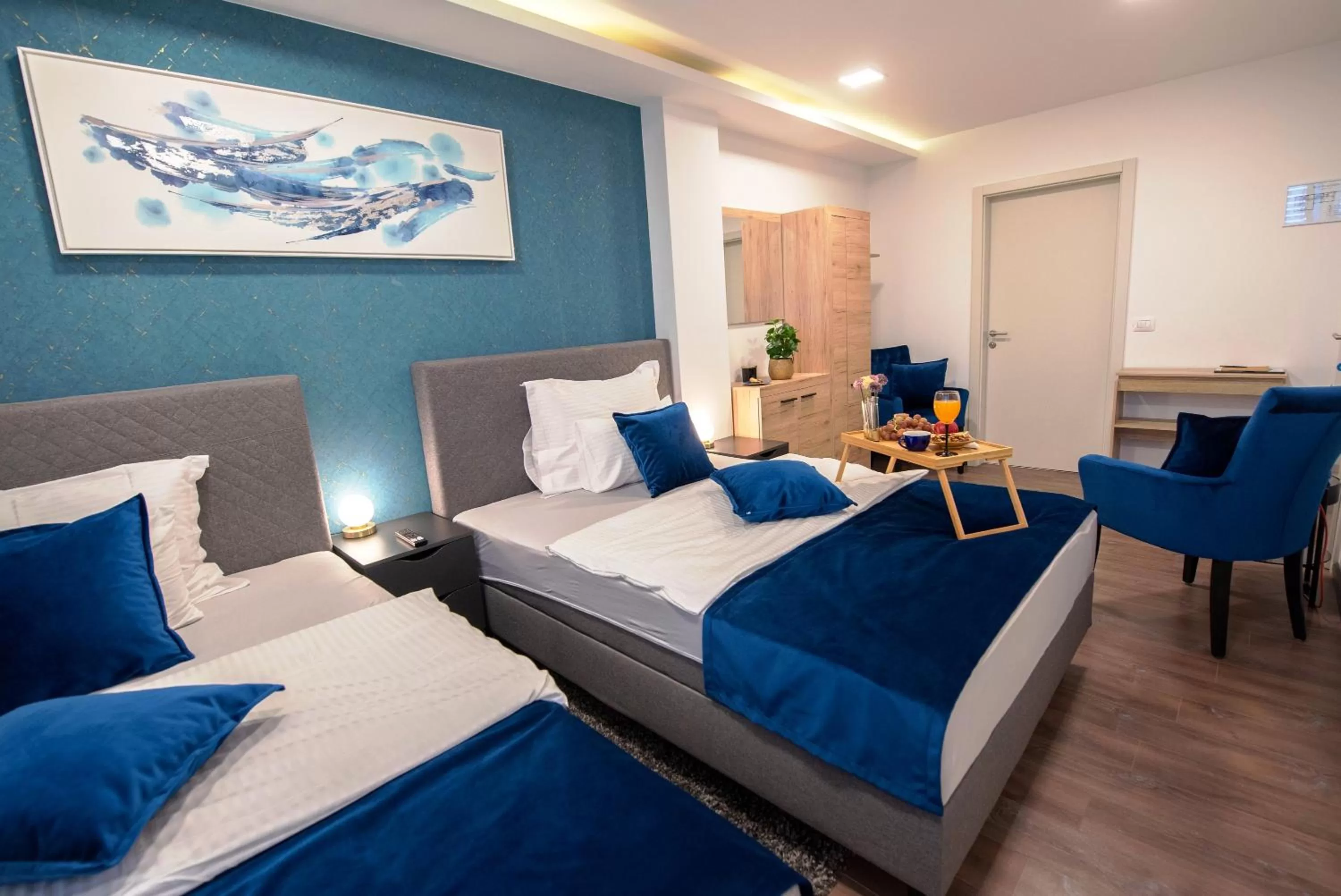 Bed in Arcobaleno Apartments & Rooms