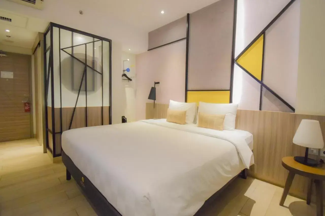 Bed in Arosa Hotel Jakarta