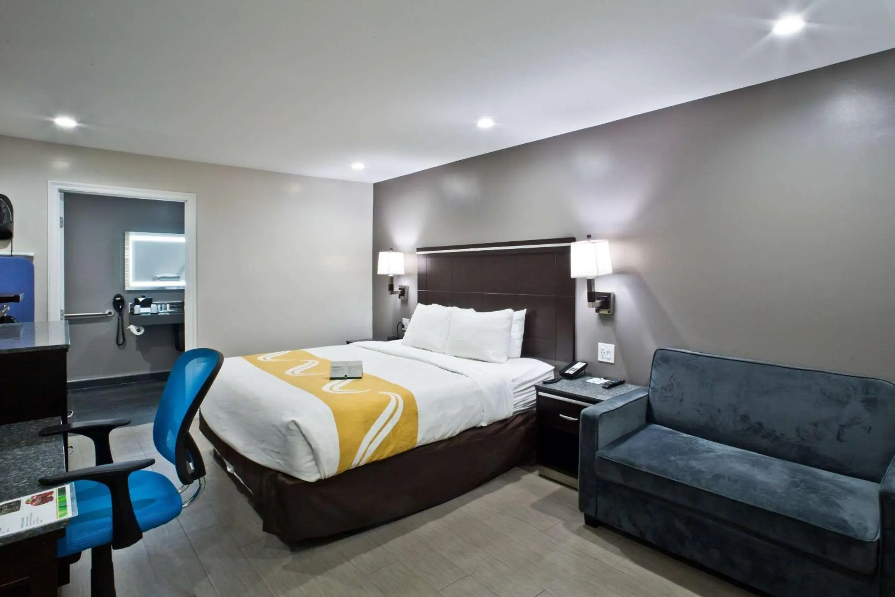 Photo of the whole room, Bed in Bay Area Inn & Suites Photo of the whole room, Bed in Bay Area Inn & Suites