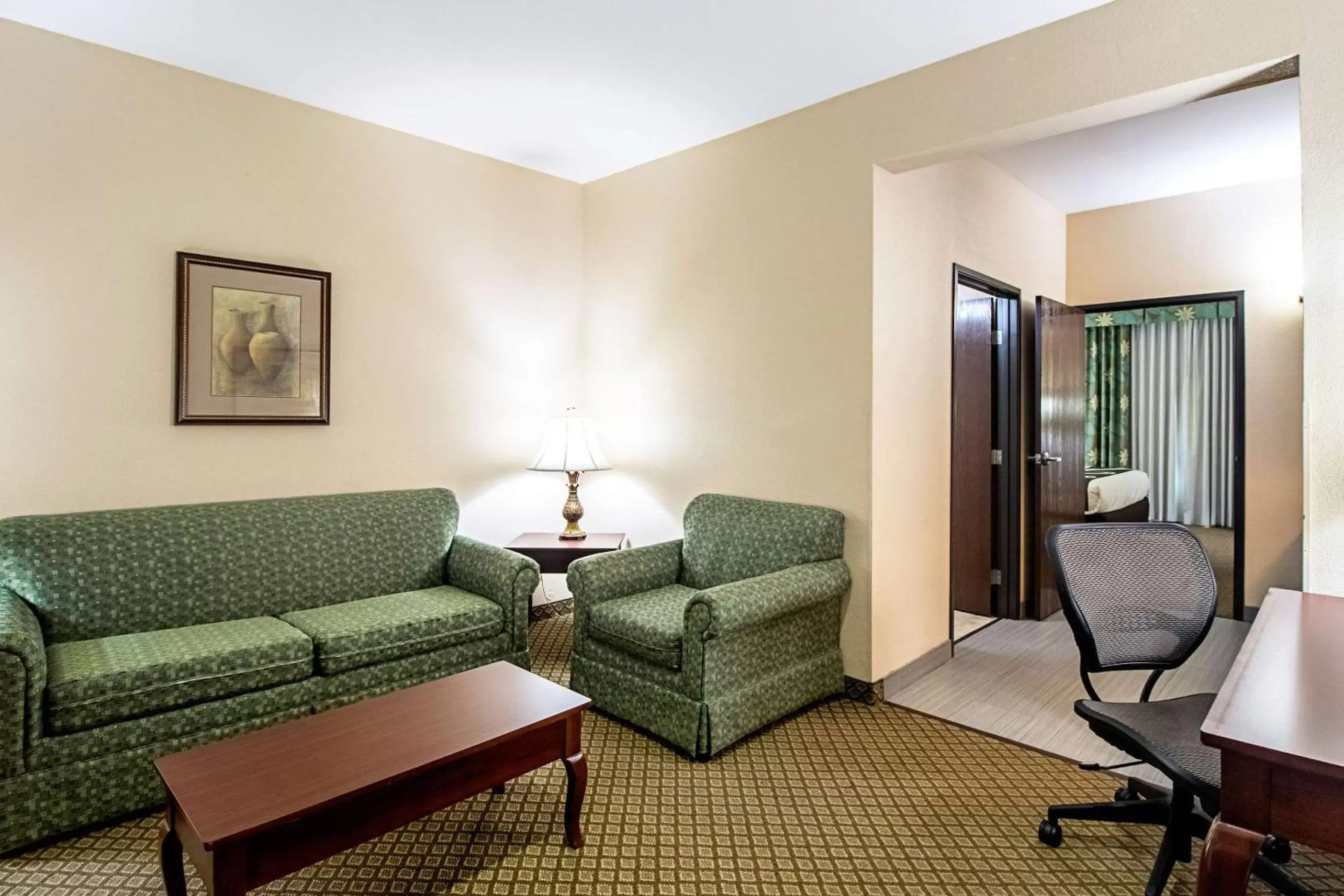 Bedroom, Seating Area in Quality Inn & Suites