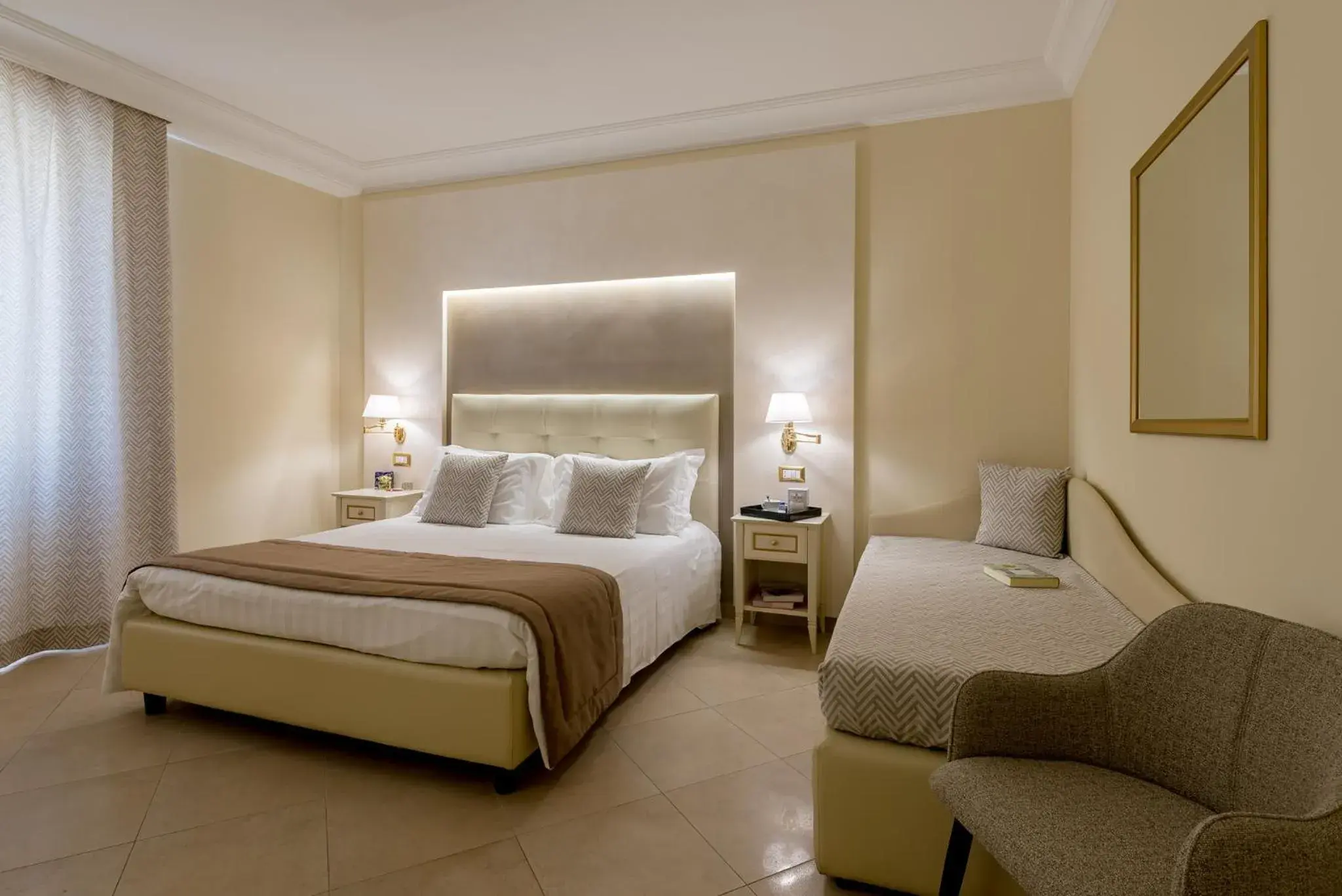 Bed in Vittorio Emanuele Boutique Hotel