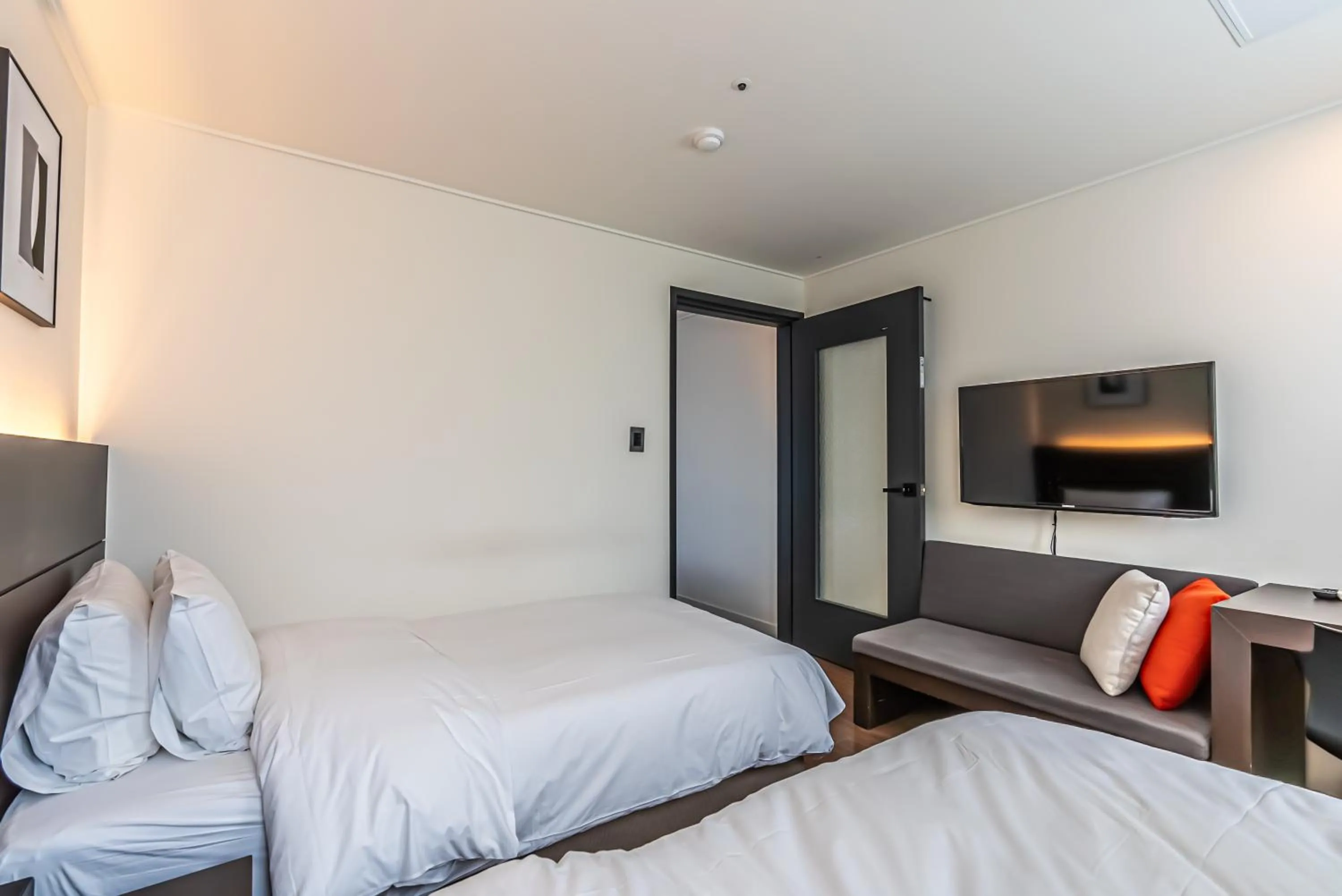 Bed in Hotel The Grang Jungmun