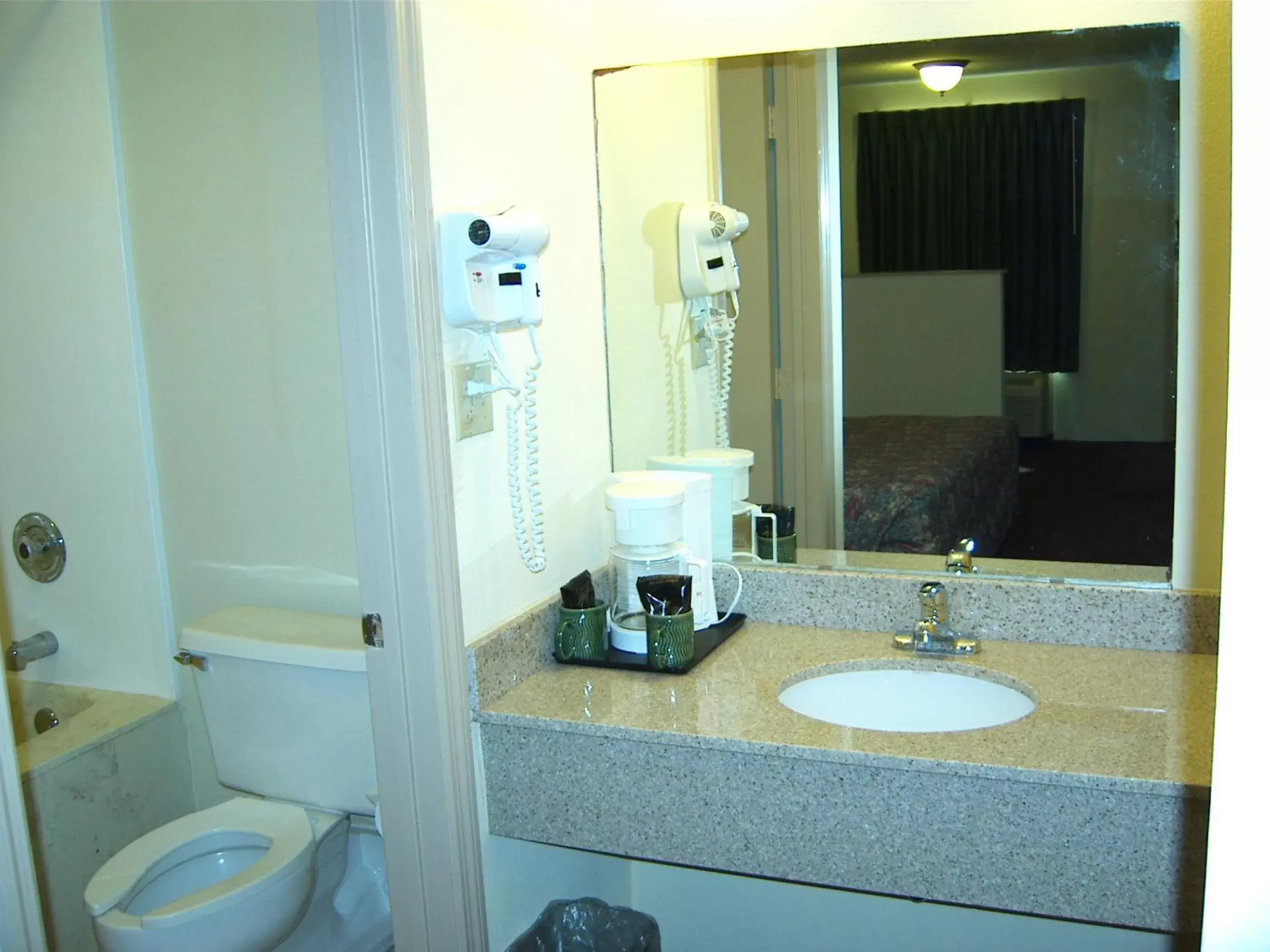 Bathroom in Travelers Inn & Suites