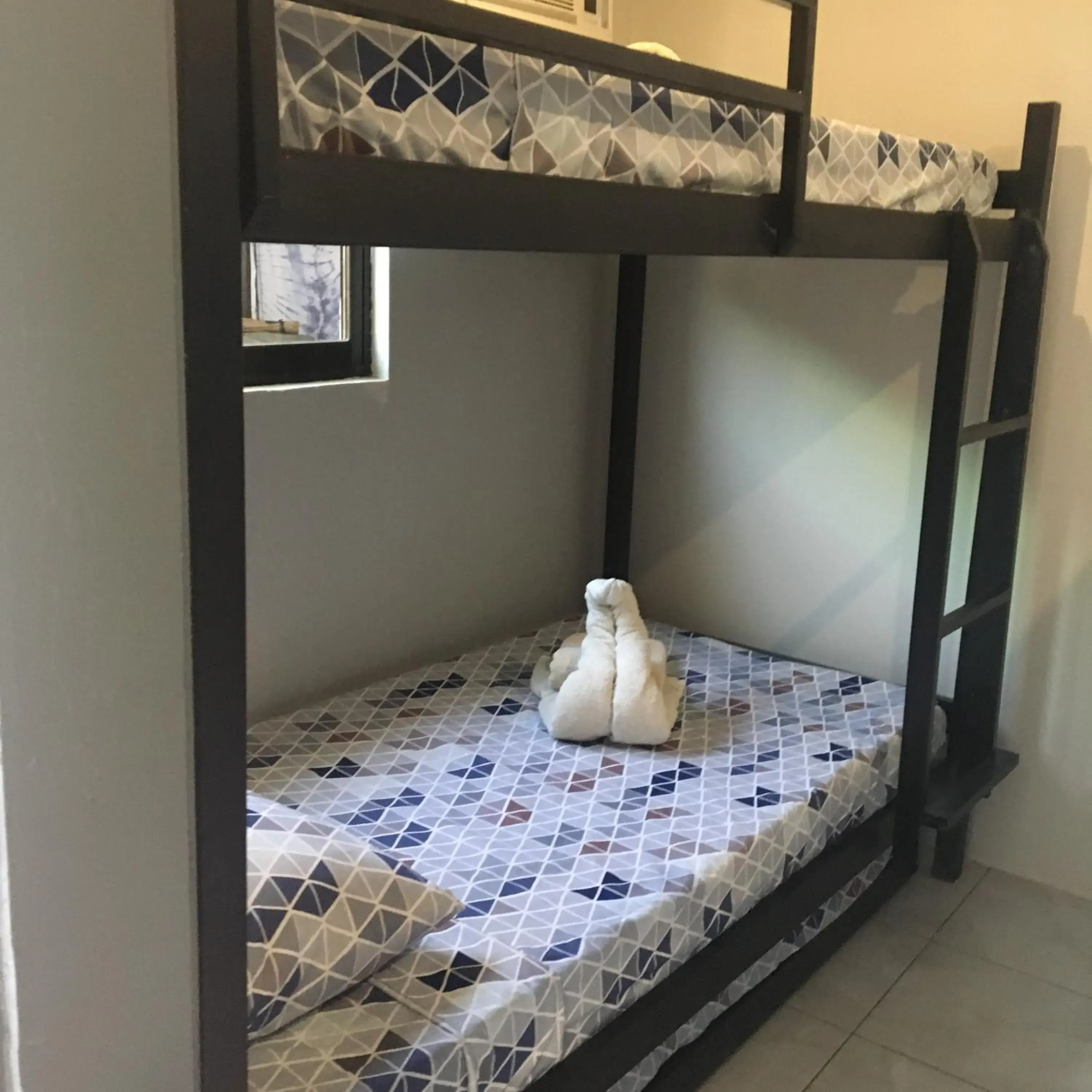 Shower, Bed in Stardust Beach Hotel Shower, Bed in Stardust Beach Hotel