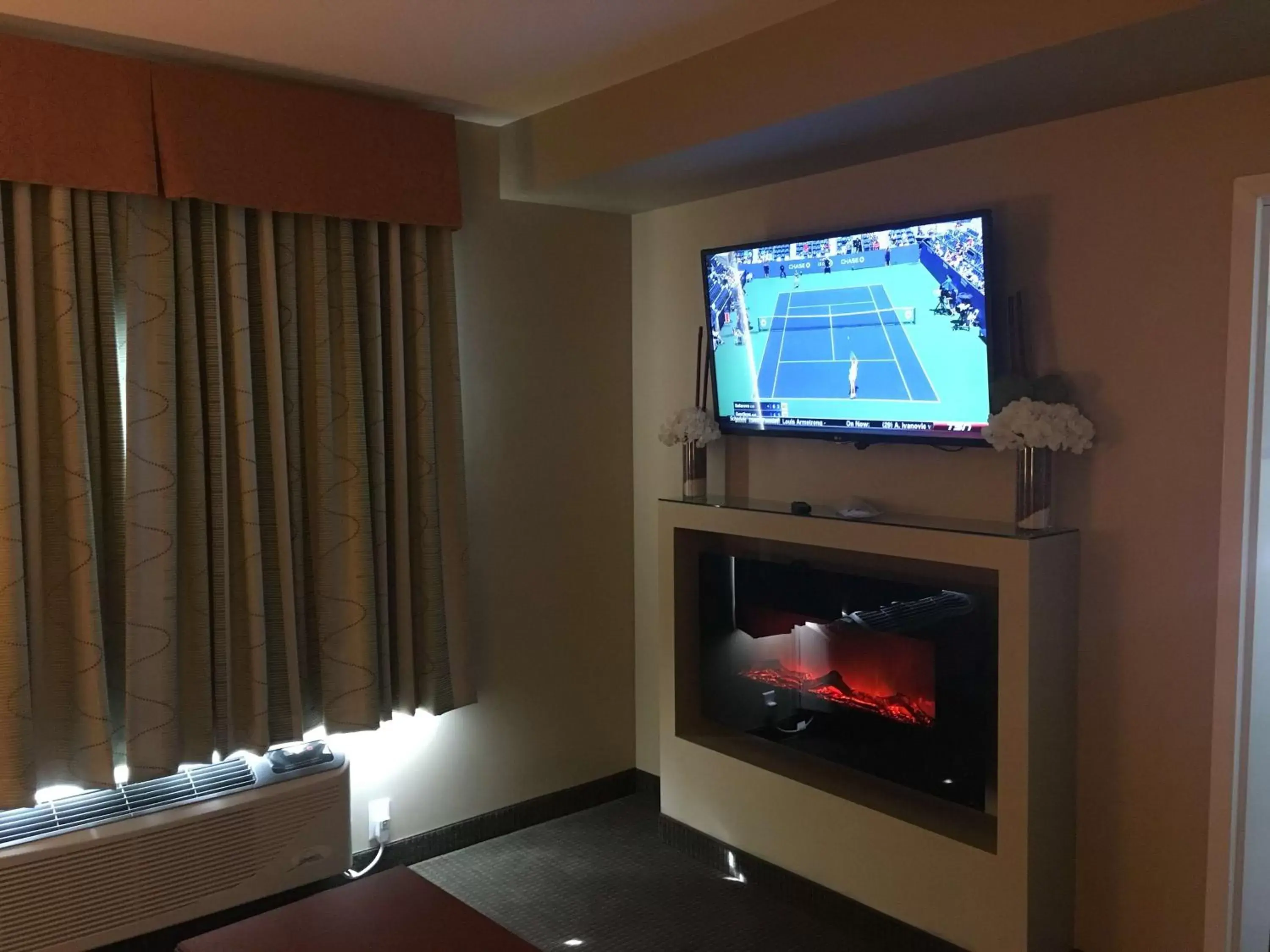 Photo of the whole room, TV/Entertainment Center in Best Western Plus Service Inn & Suites