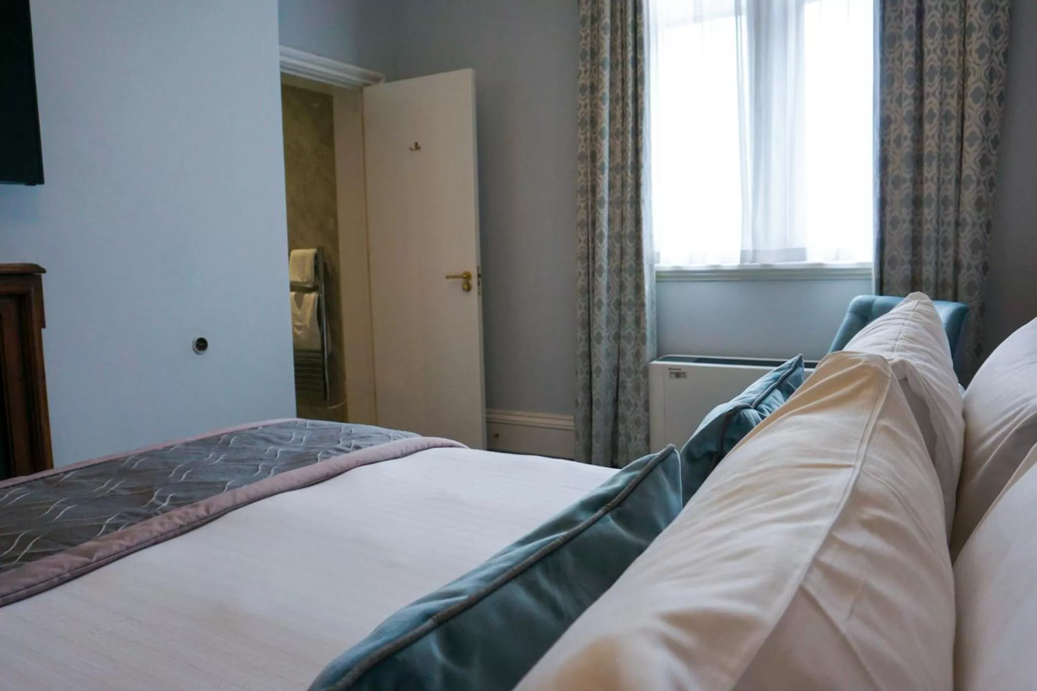 Bed in Wroxall Abbey Hotel