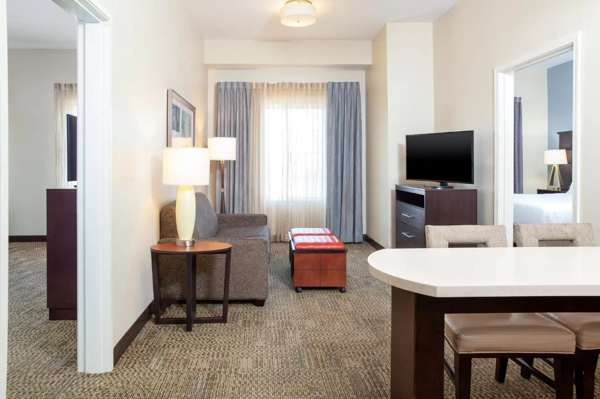 Photo of the whole room, Seating Area in Staybridge Suites Denver - Central Park, an IHG Hotel