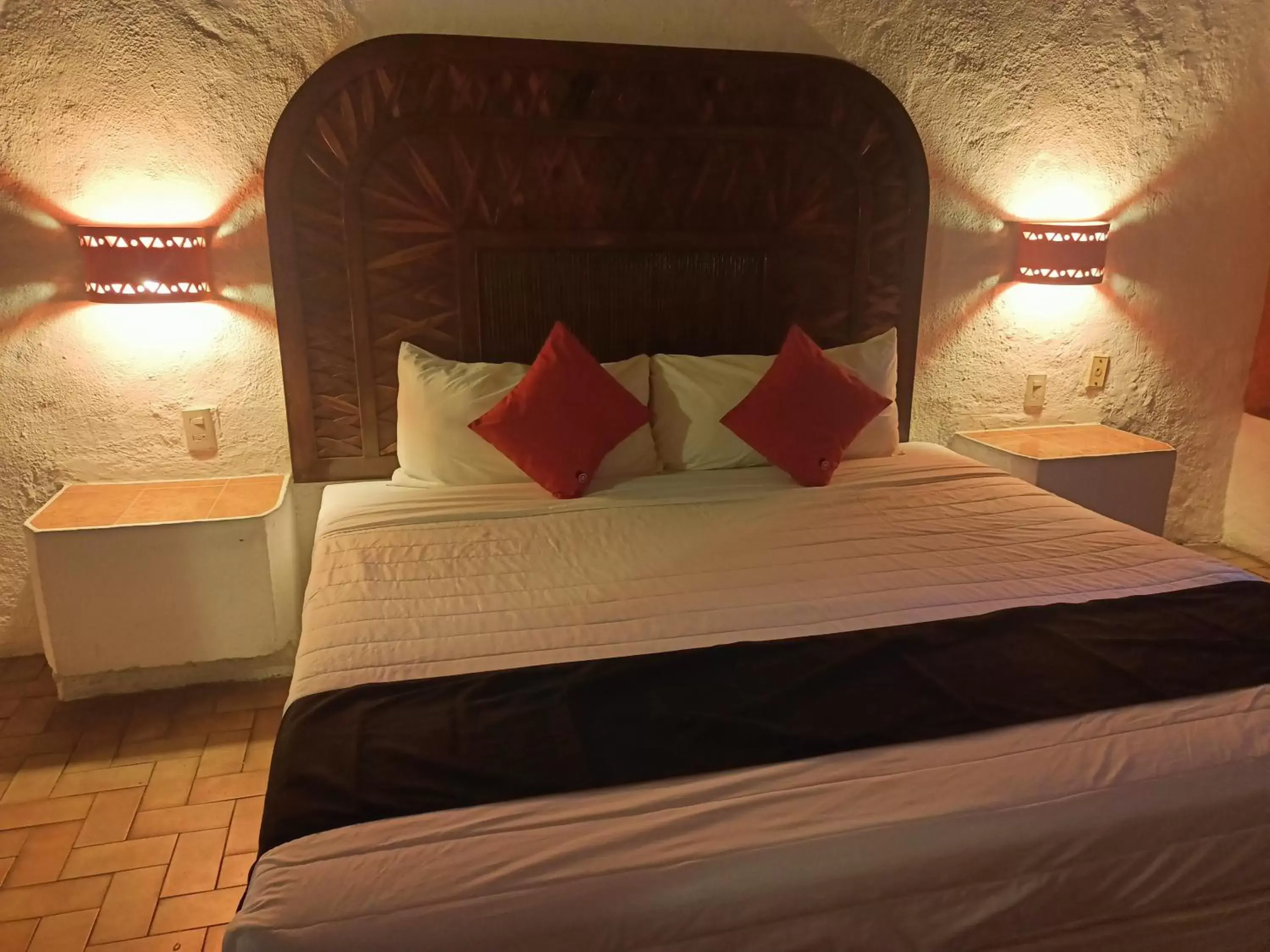 Bed in hotel plaza tucanes