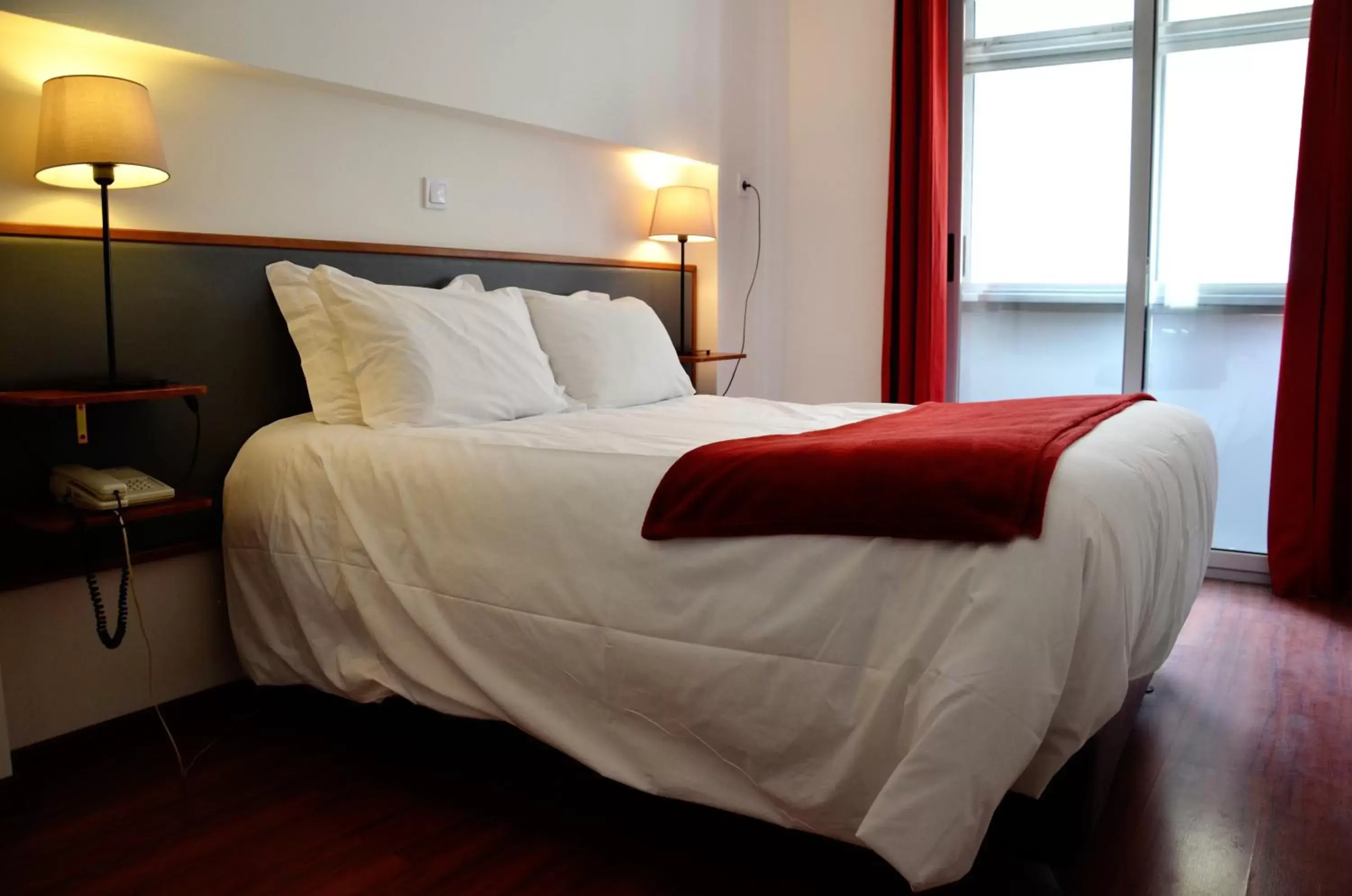 Bed in Hotel Girassol