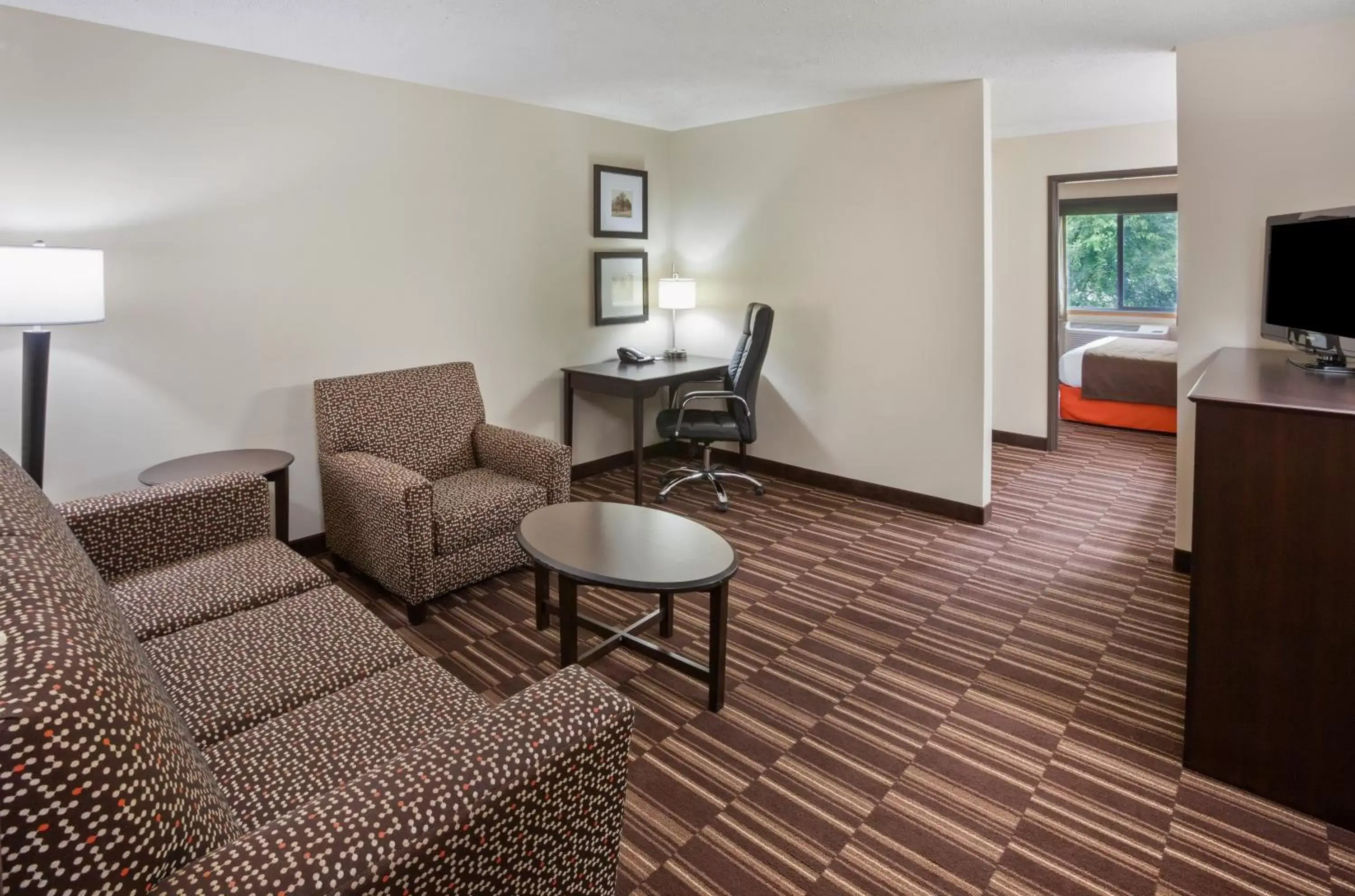 Living room, Seating Area in AmericInn by Wyndham Sartell