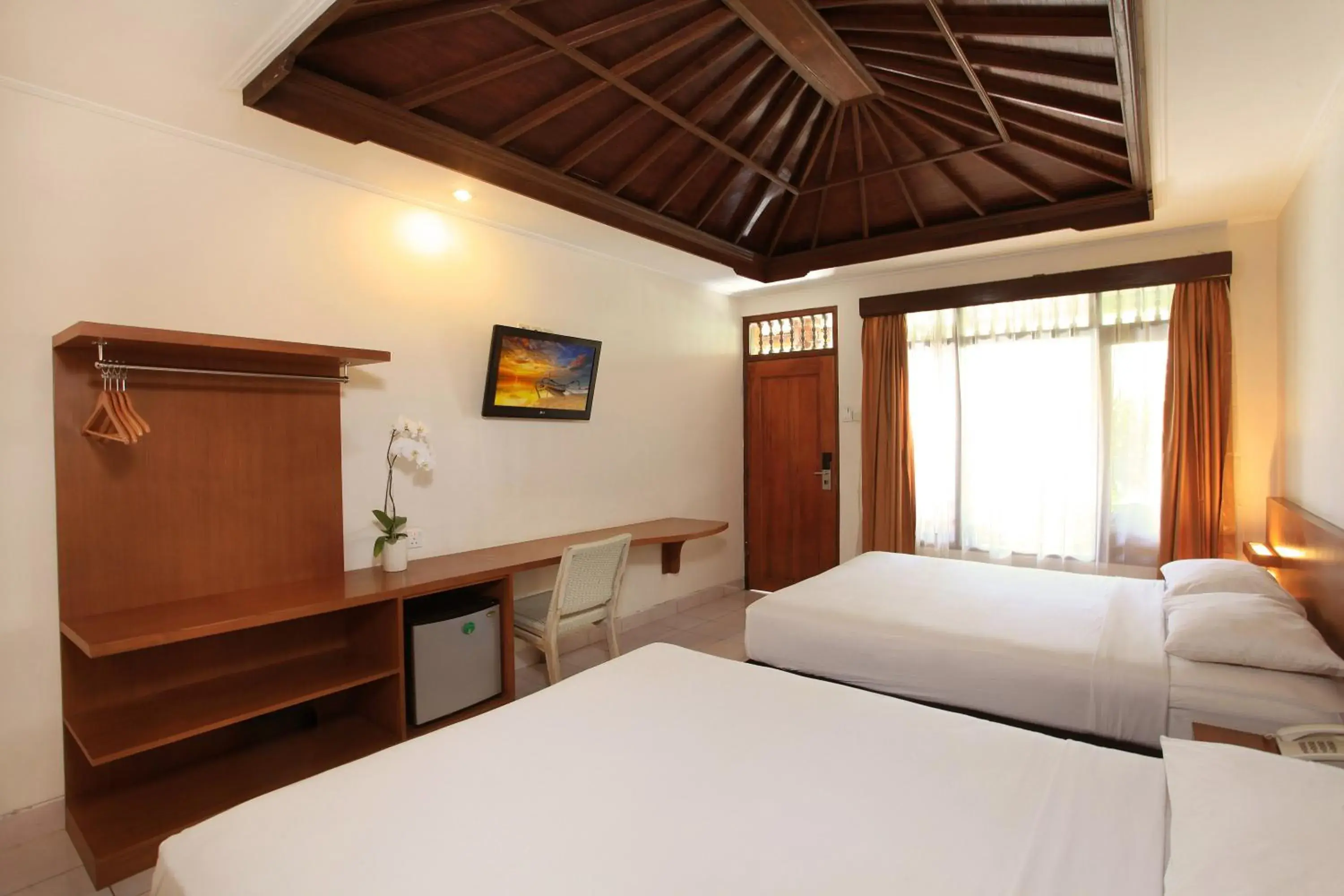 Bedroom in Matahari Bungalow Hotel