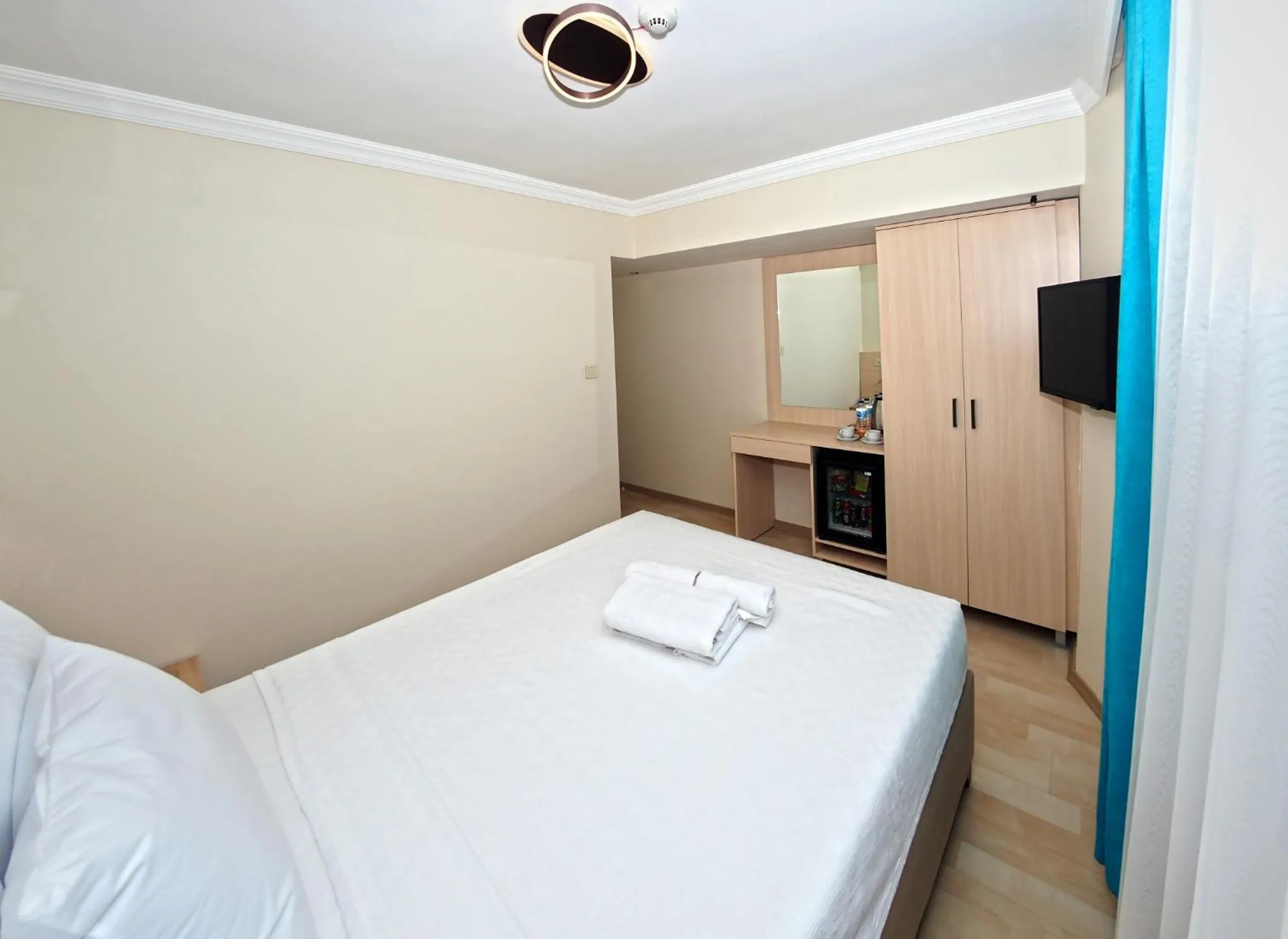 Bed in Le Safran Palace Hotel