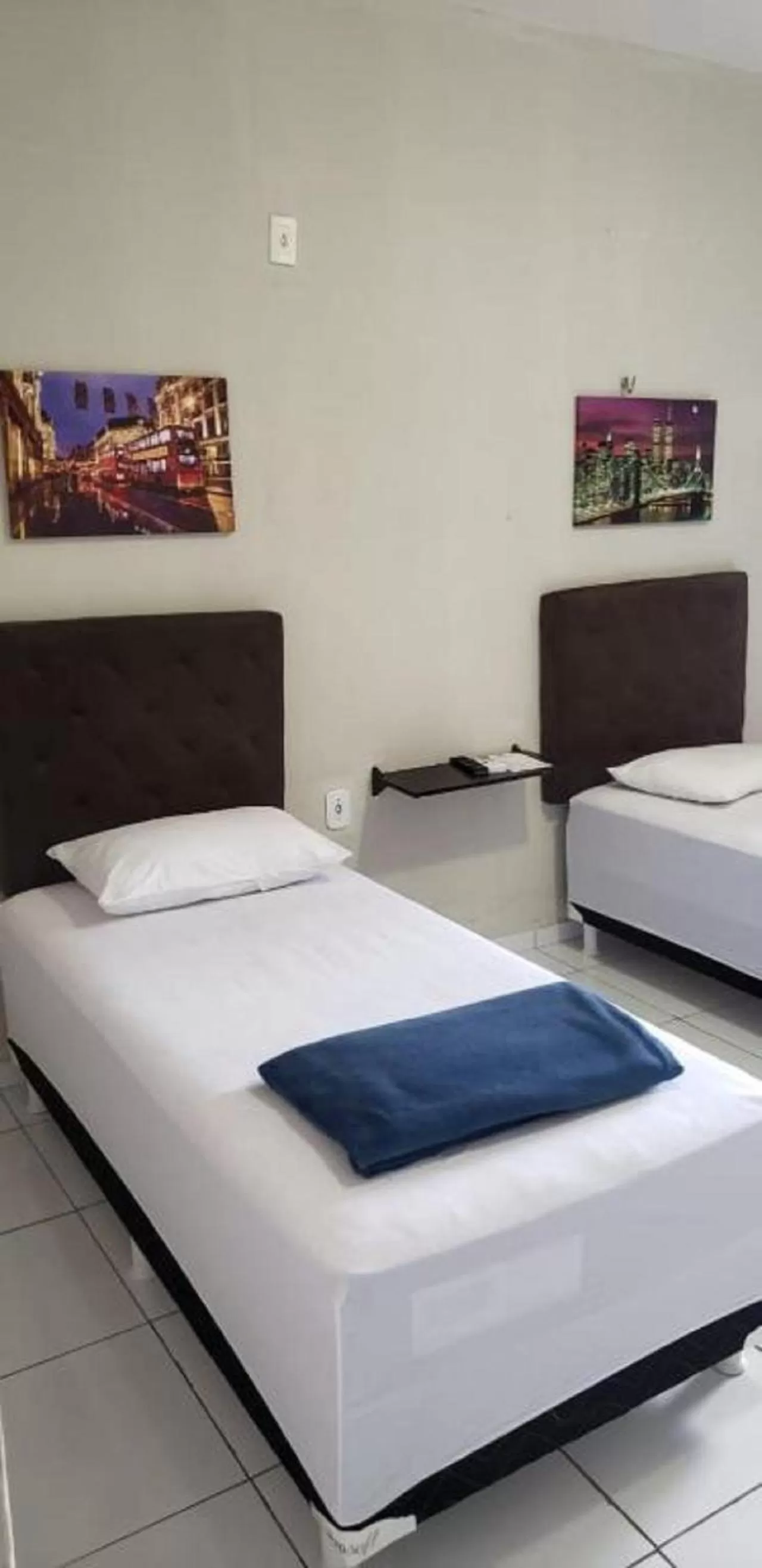 Bed in Pousada e Posto Amigão