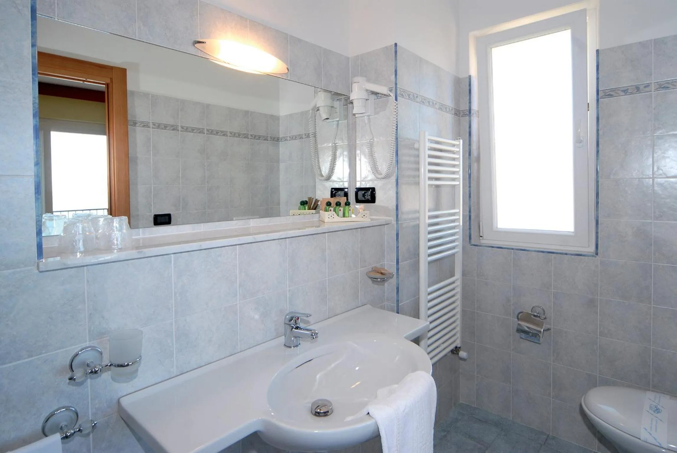 Bathroom in Piccolo Hotel