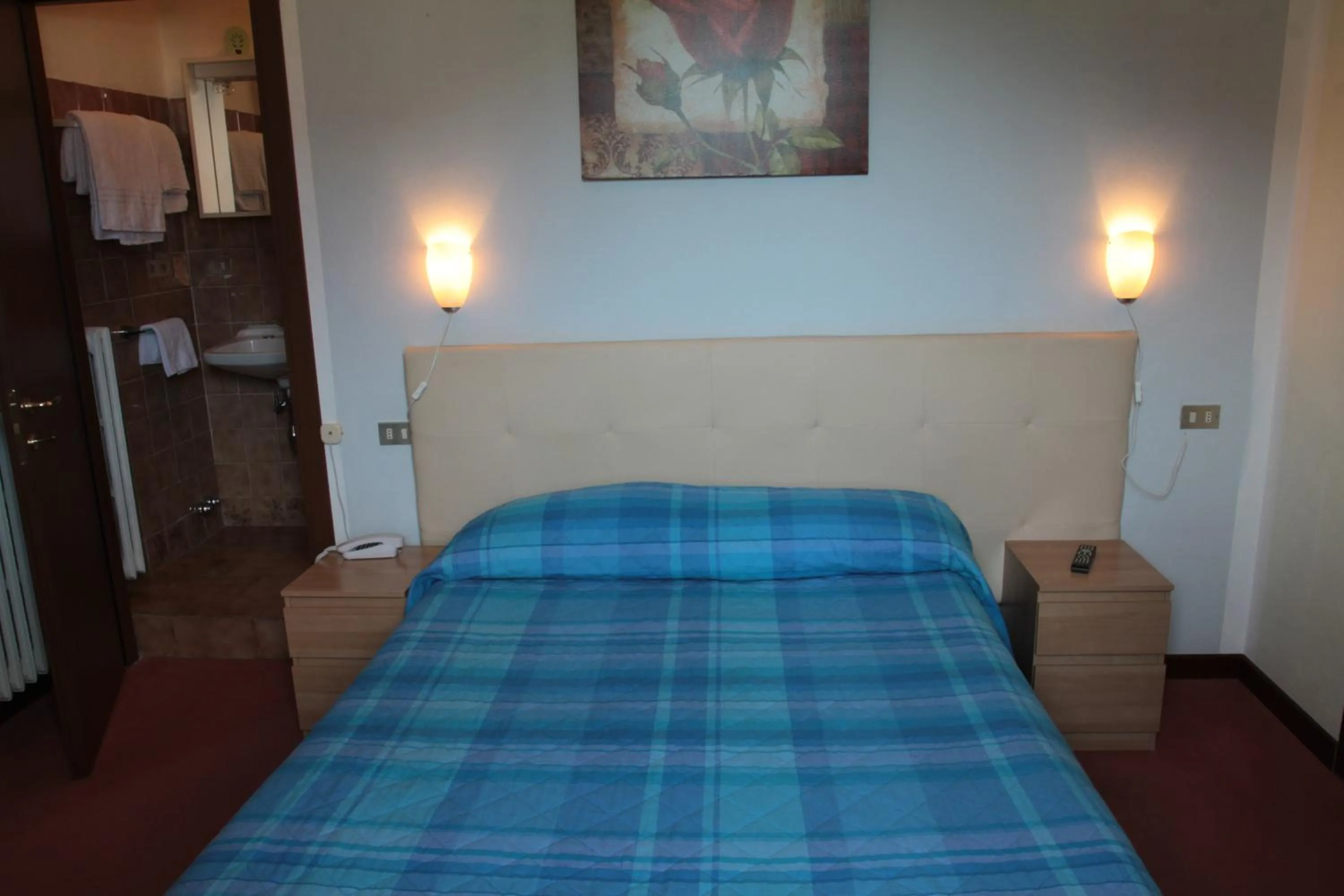 Bed in Hotel Domodossola