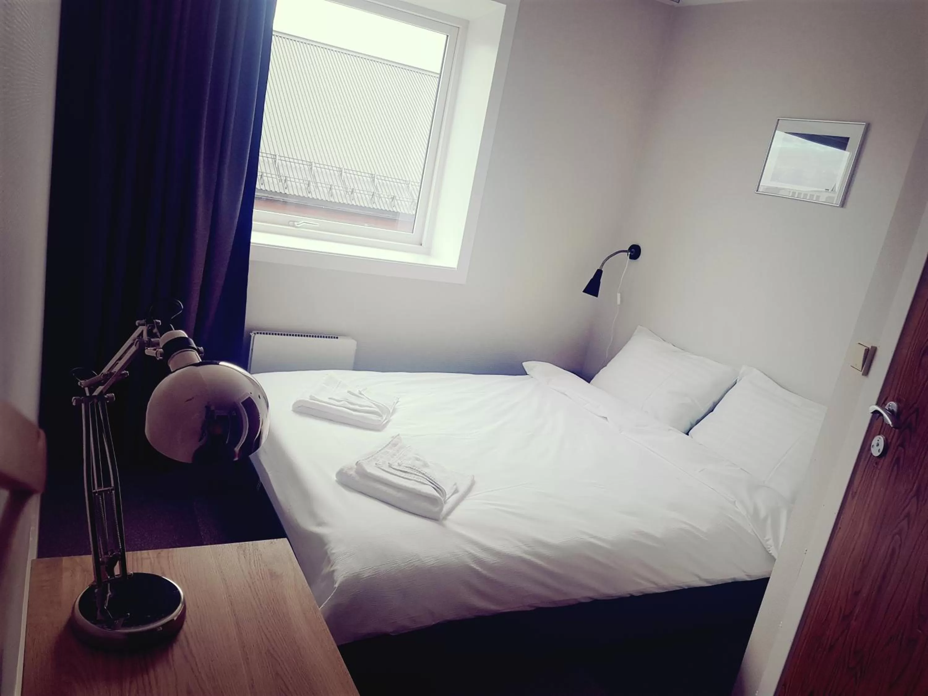 Bed in Arctic Hotel Nordkapp