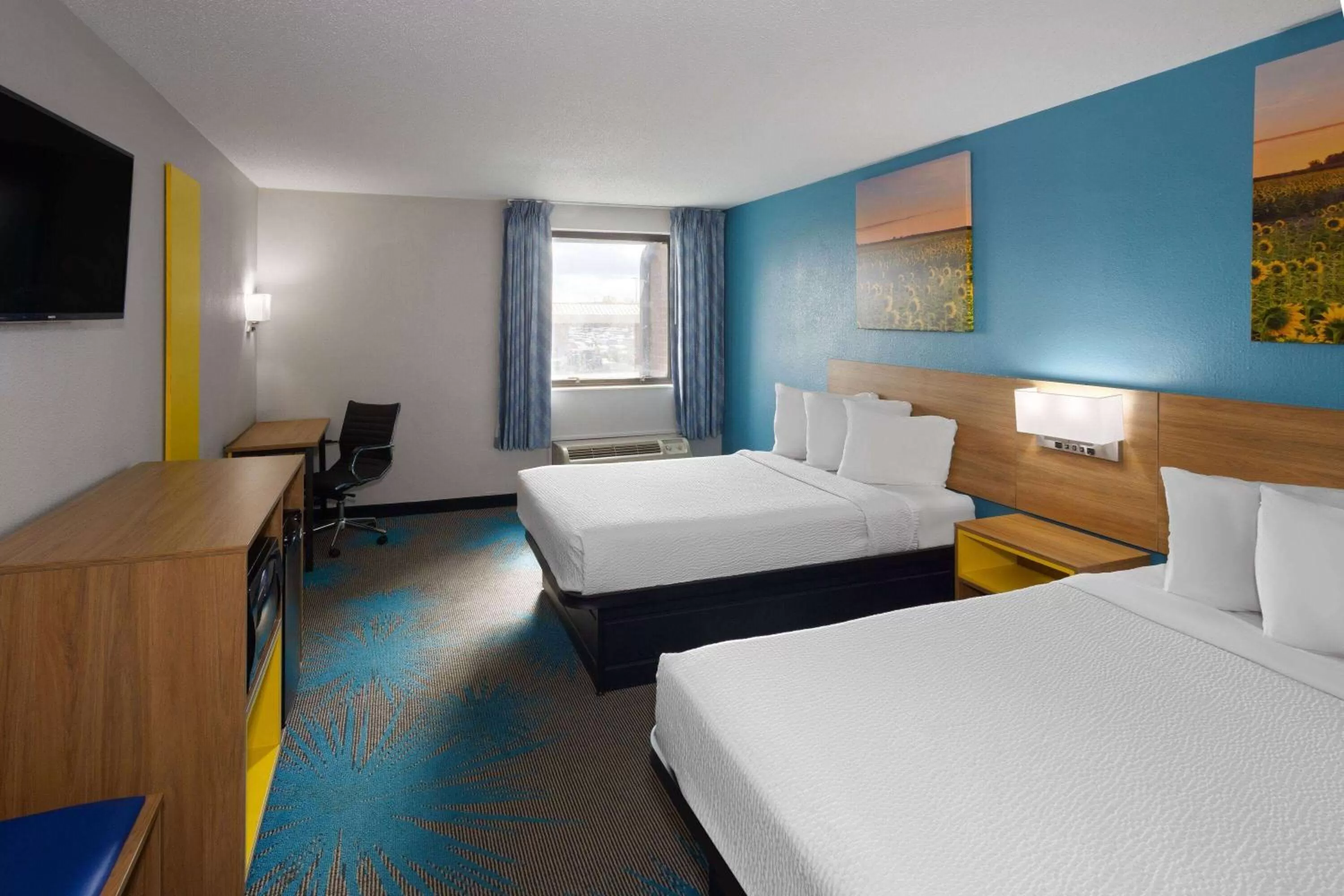 Photo of the whole room, Bed in Days Inn & Suites by Wyndham Northwest Indianapolis