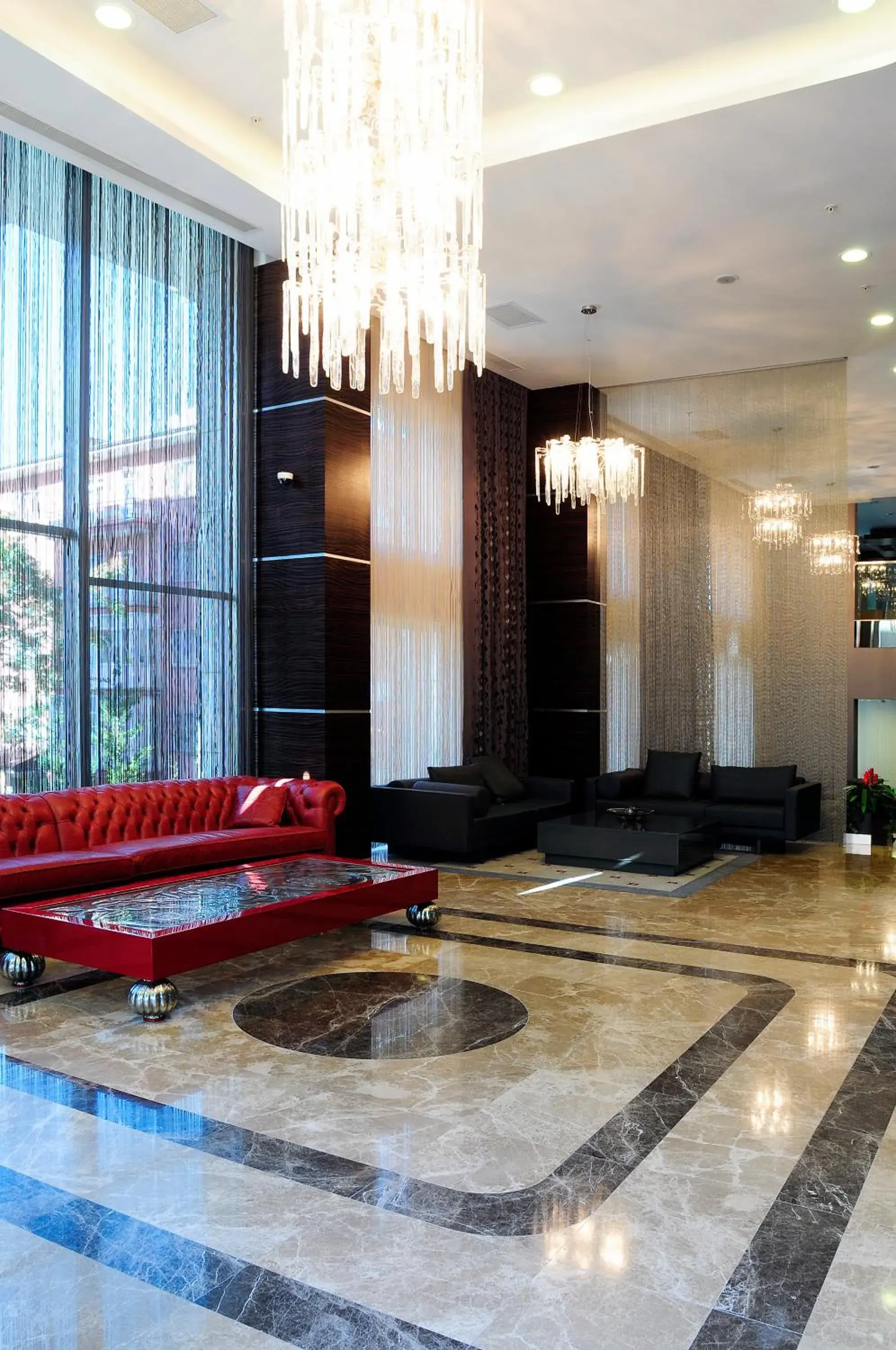 Lobby or reception in Demora Hotel