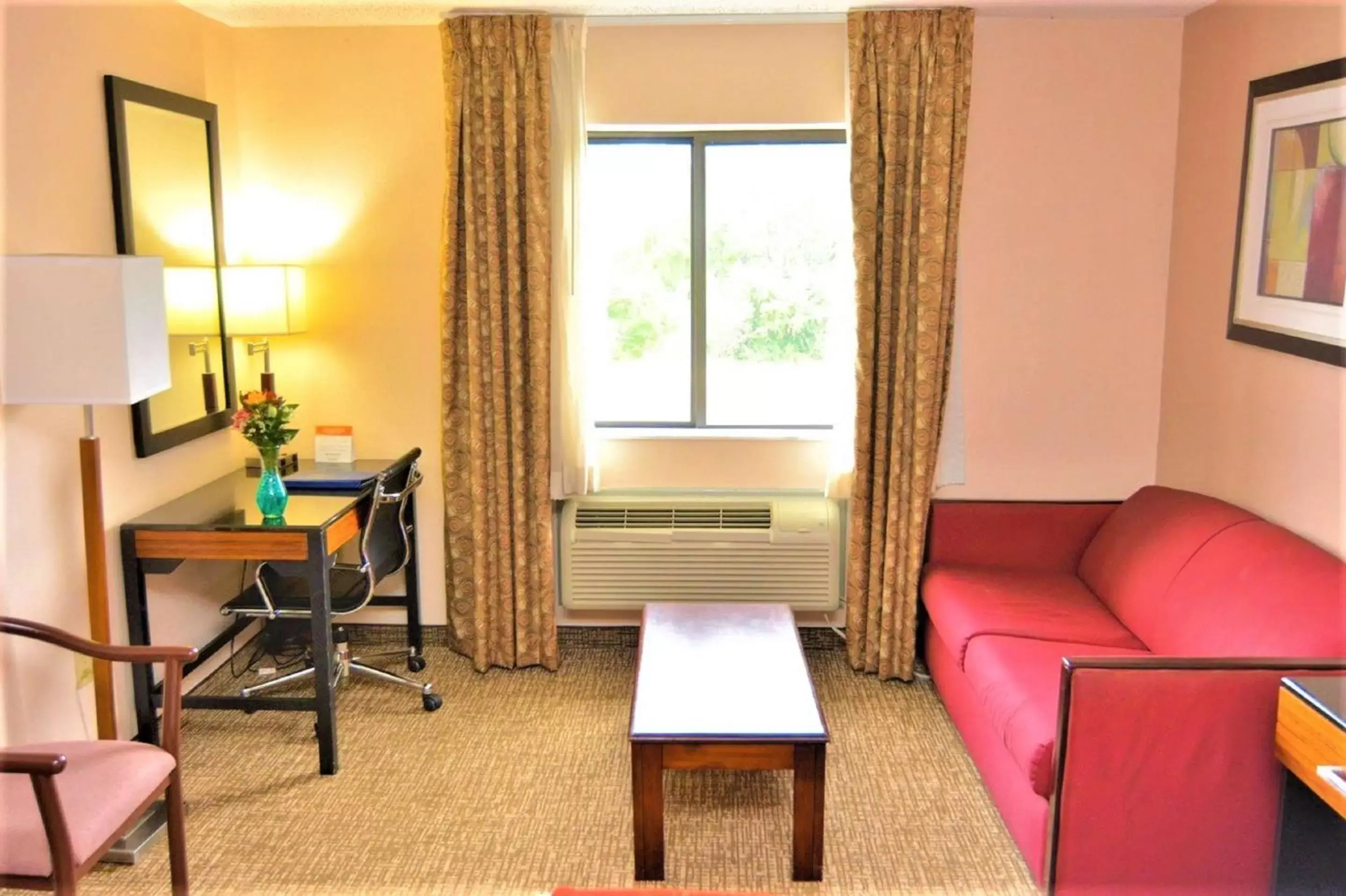 Bedroom, Seating Area in SureStay Plus by Best Western Reading North