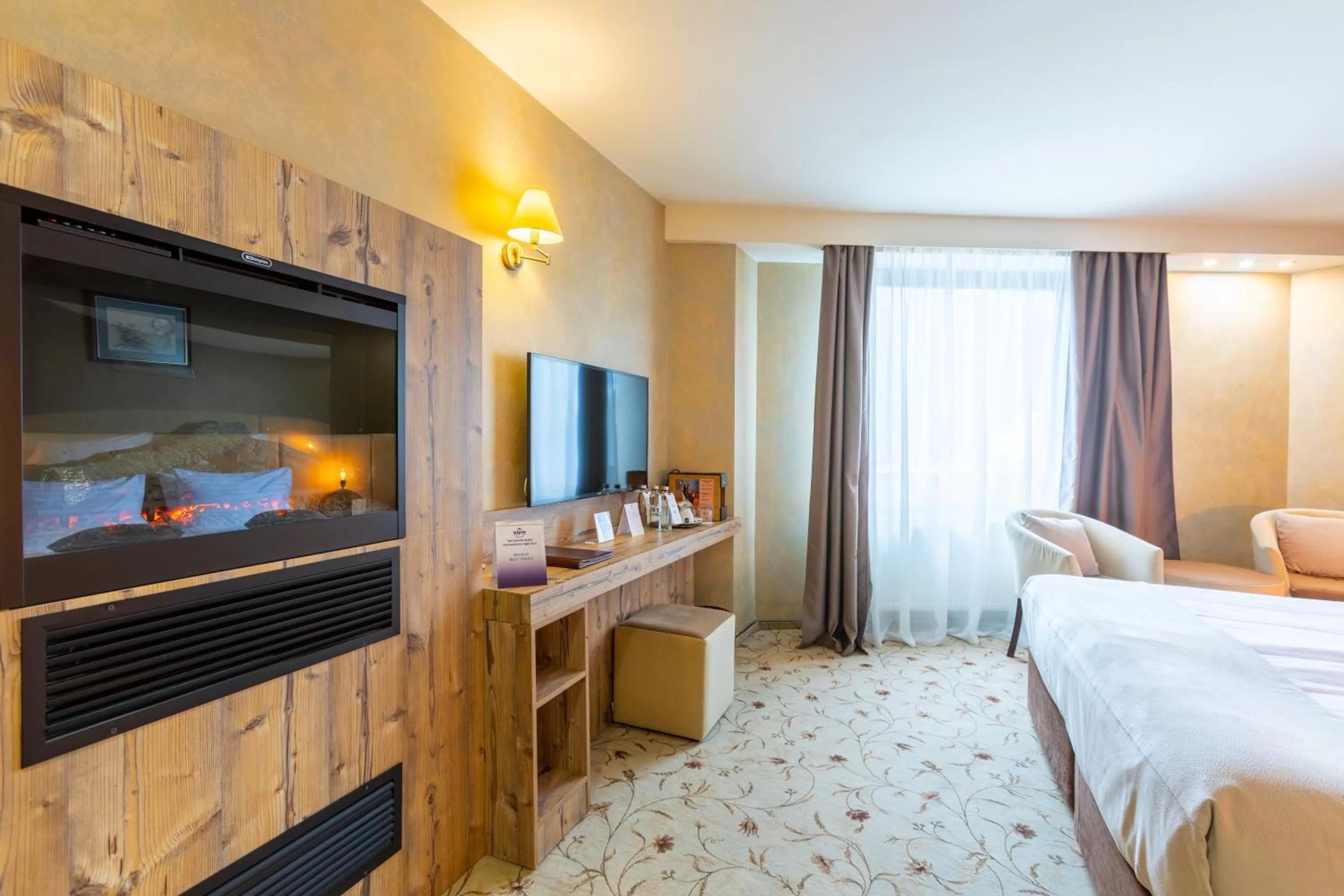 Bed in Alpin Resort Hotel