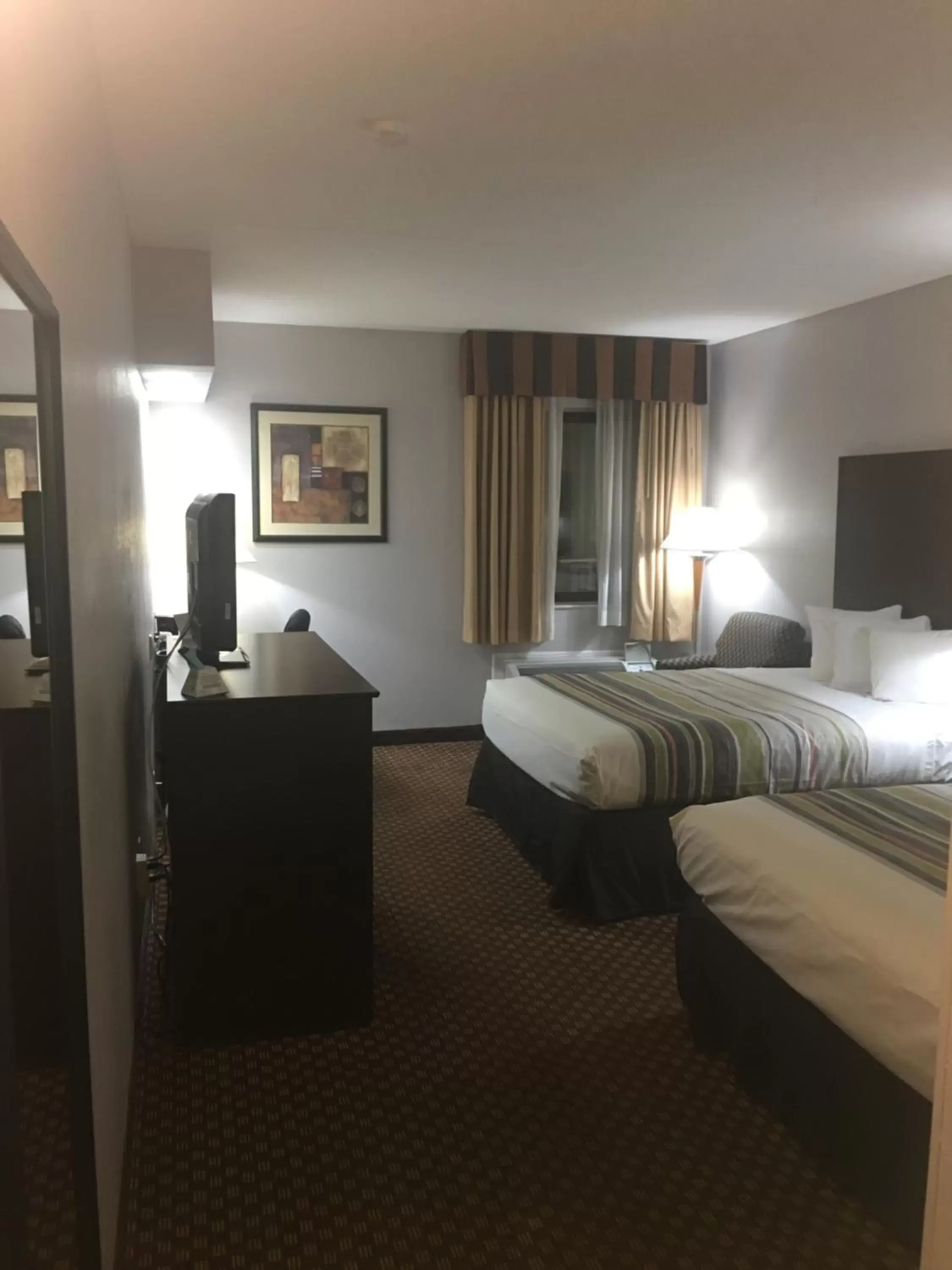 Bed, TV/Entertainment Center in Country Inn & Suites by Radisson, Indianapolis East, IN