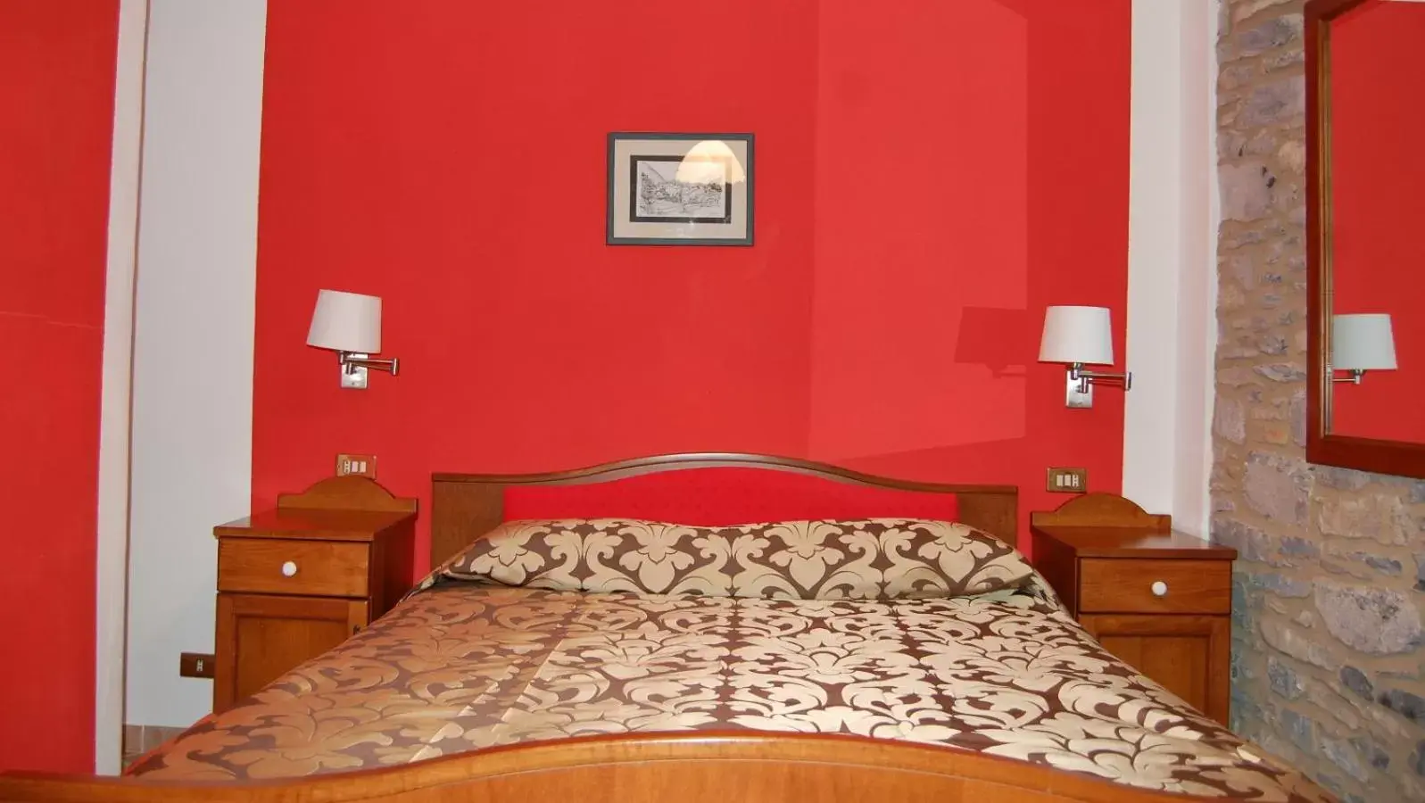 Bed in Albergo Miramonti