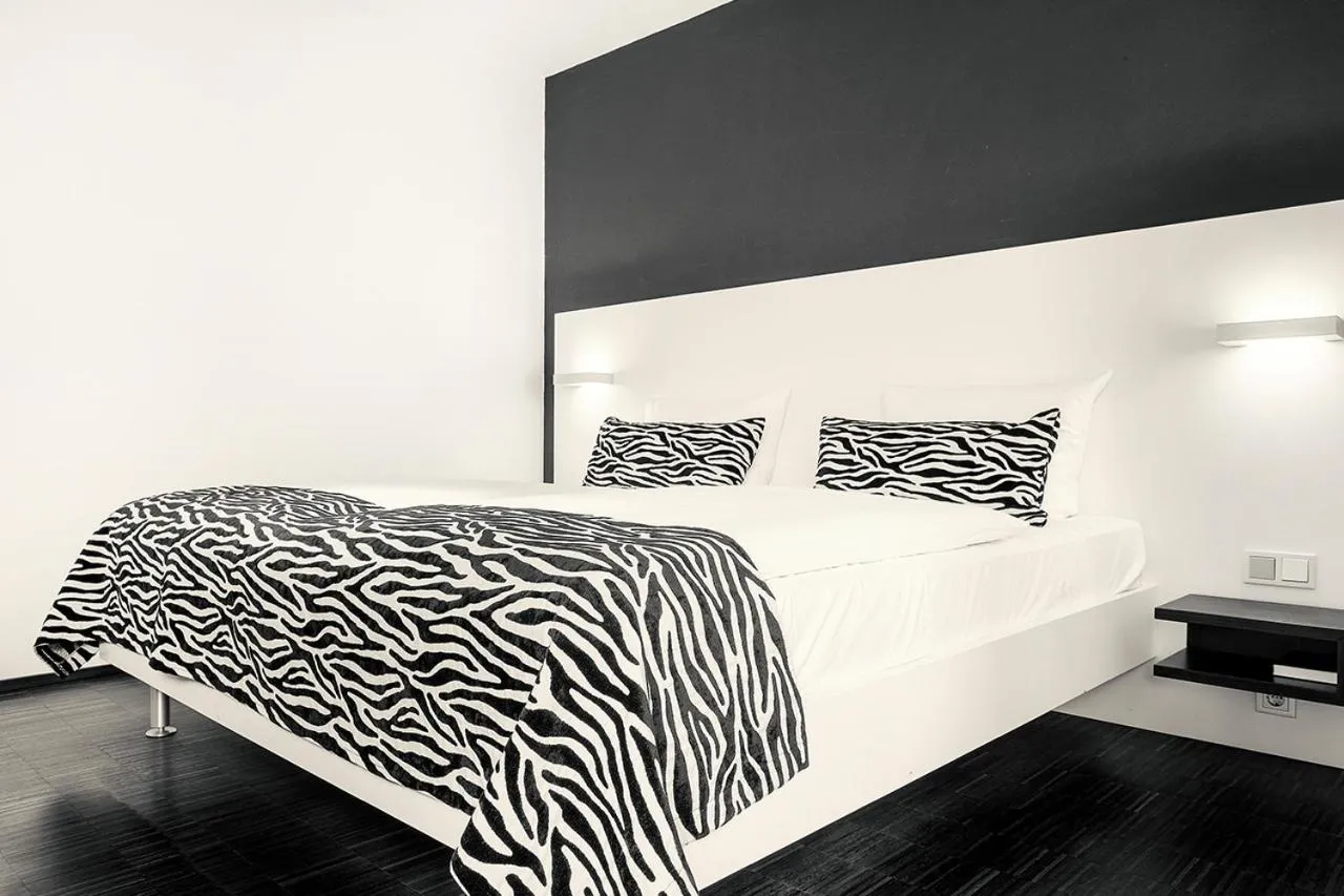 Bed in BECKER´S Hotel & Restaurant