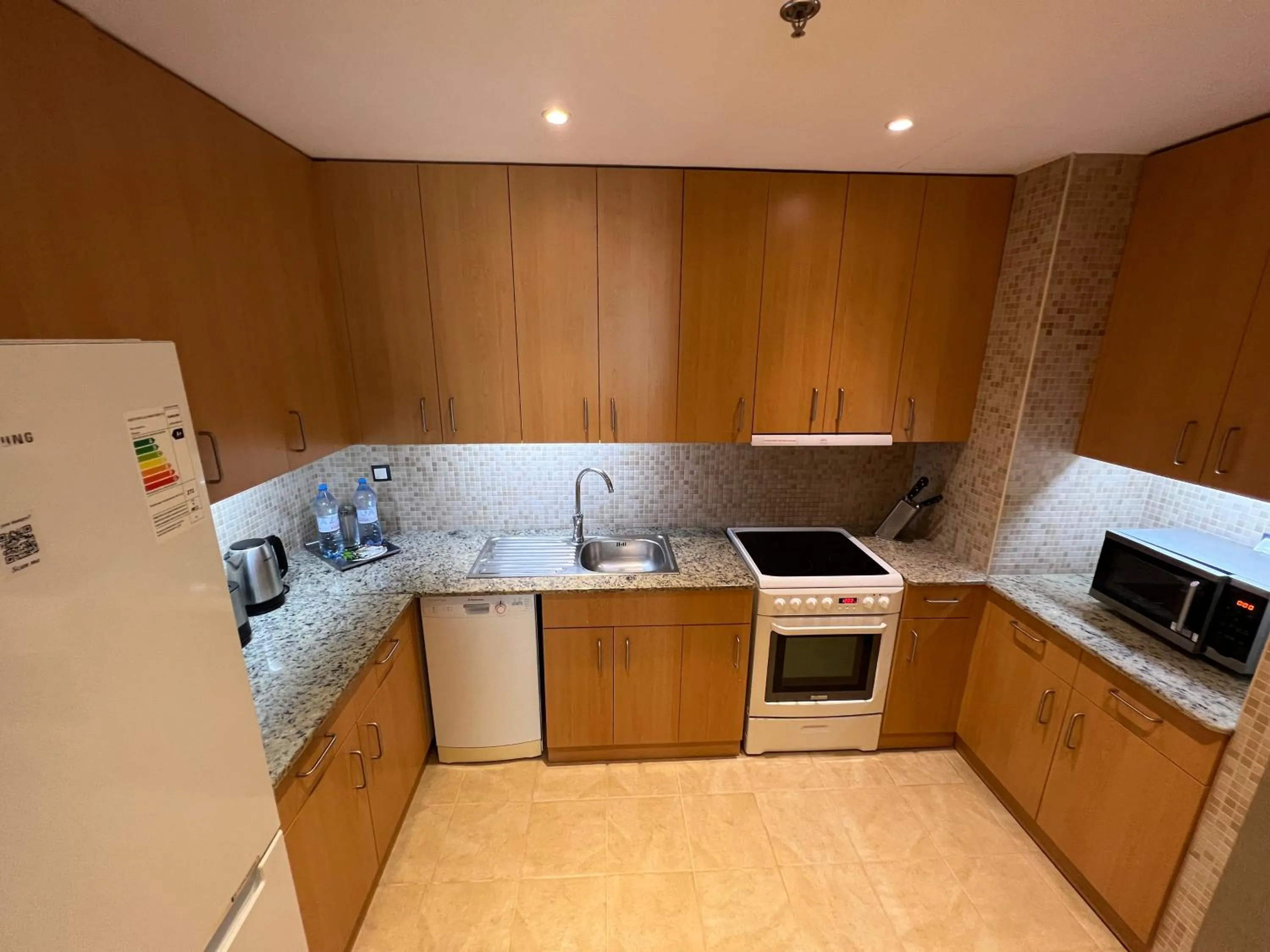 Coffee/tea facilities in Atyrau Executive Apartments