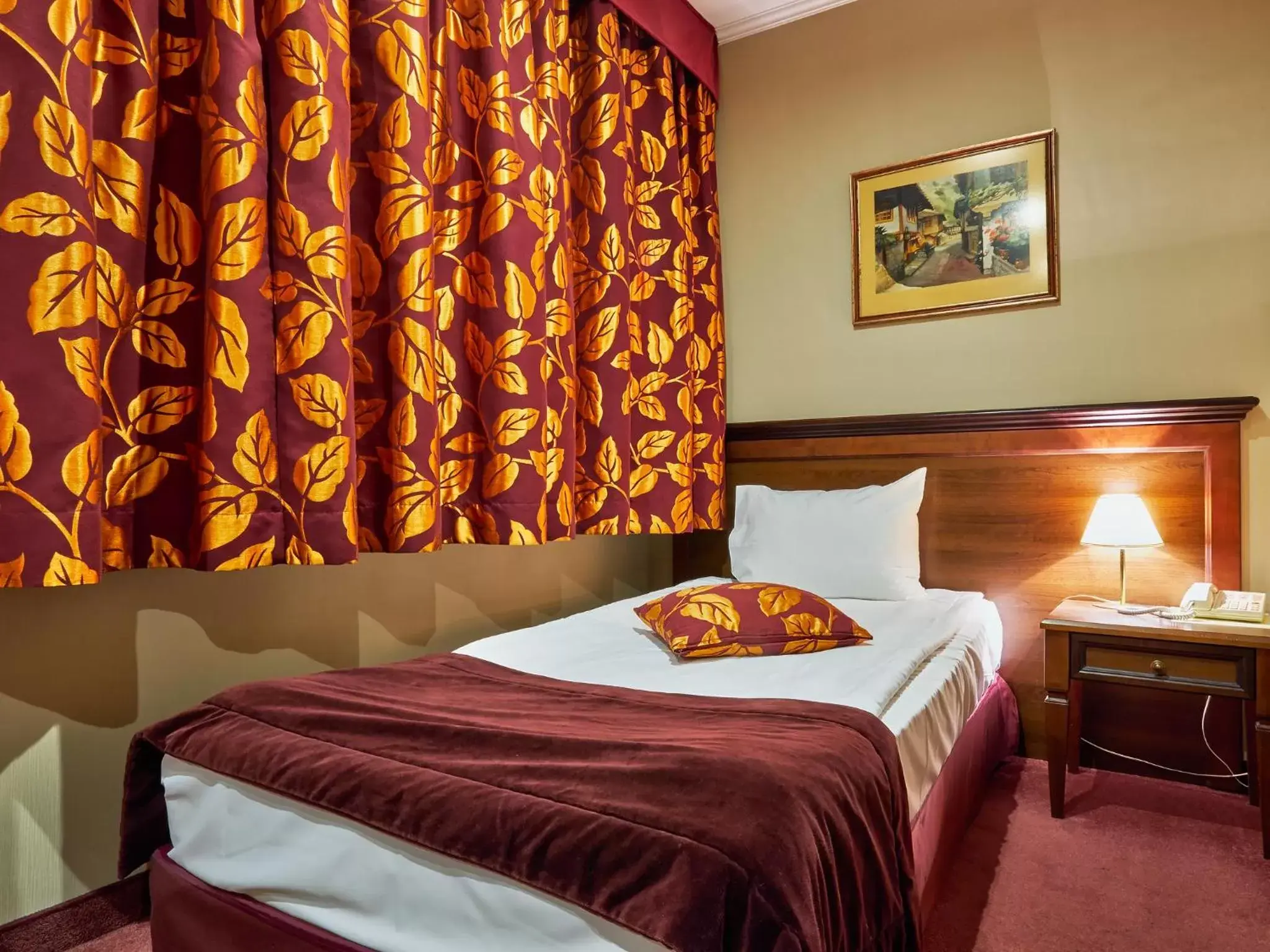 Bed in Yantra Grand Hotel