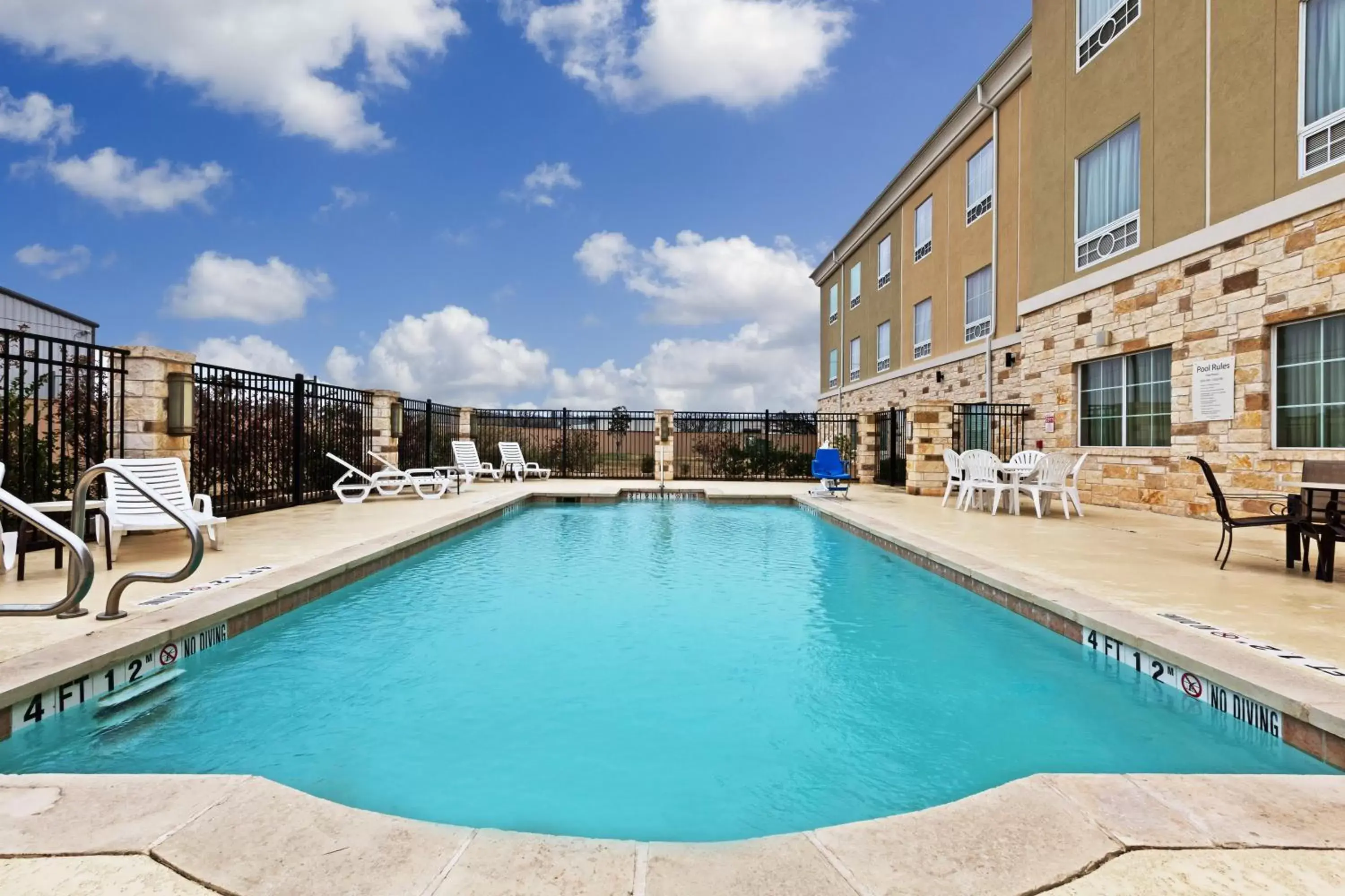 Swimming Pool in Holiday Inn Express & Suites Brady, an IHG Hotel