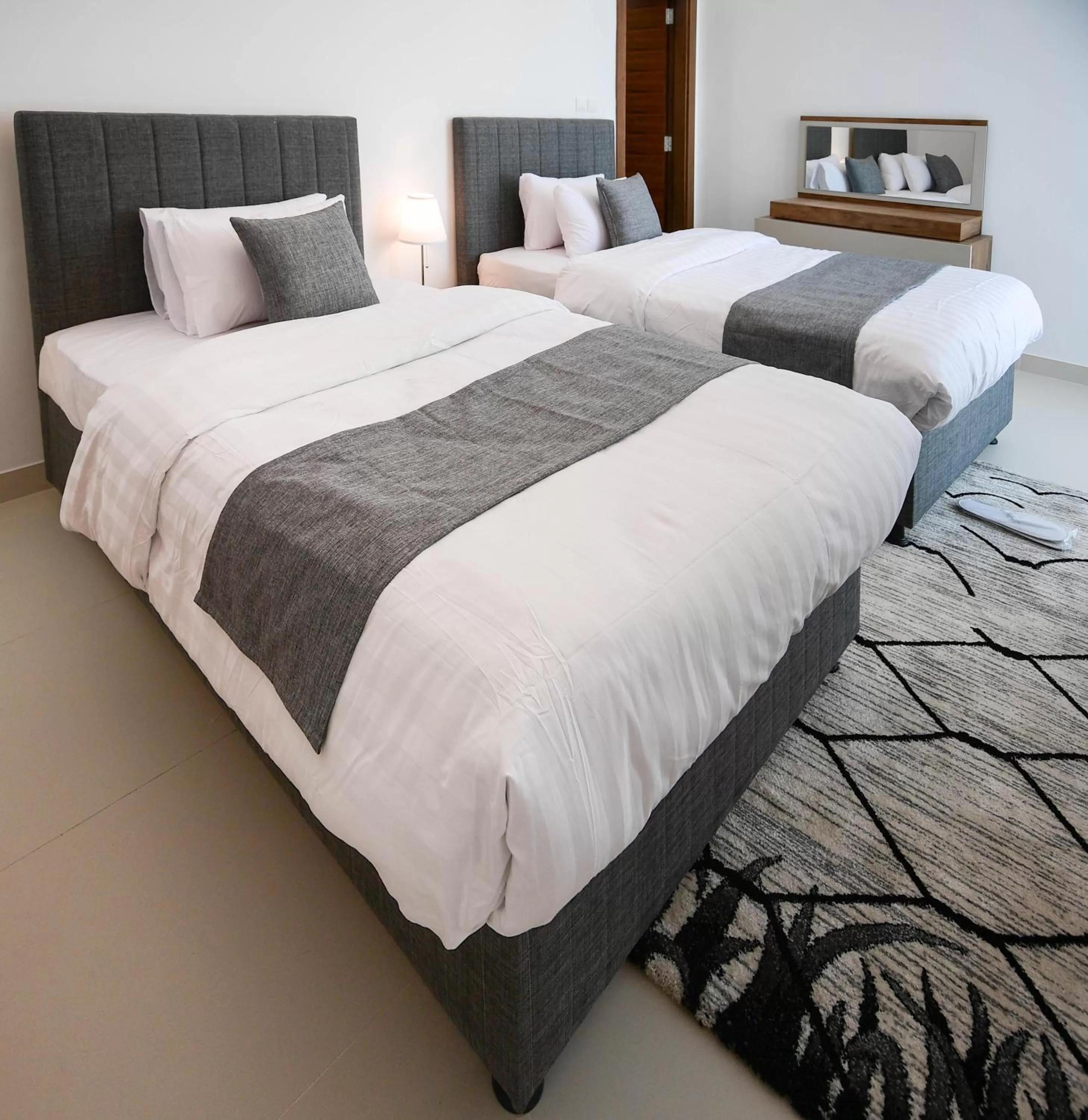 Bed in Noor Amwaj Hotel & Apartment