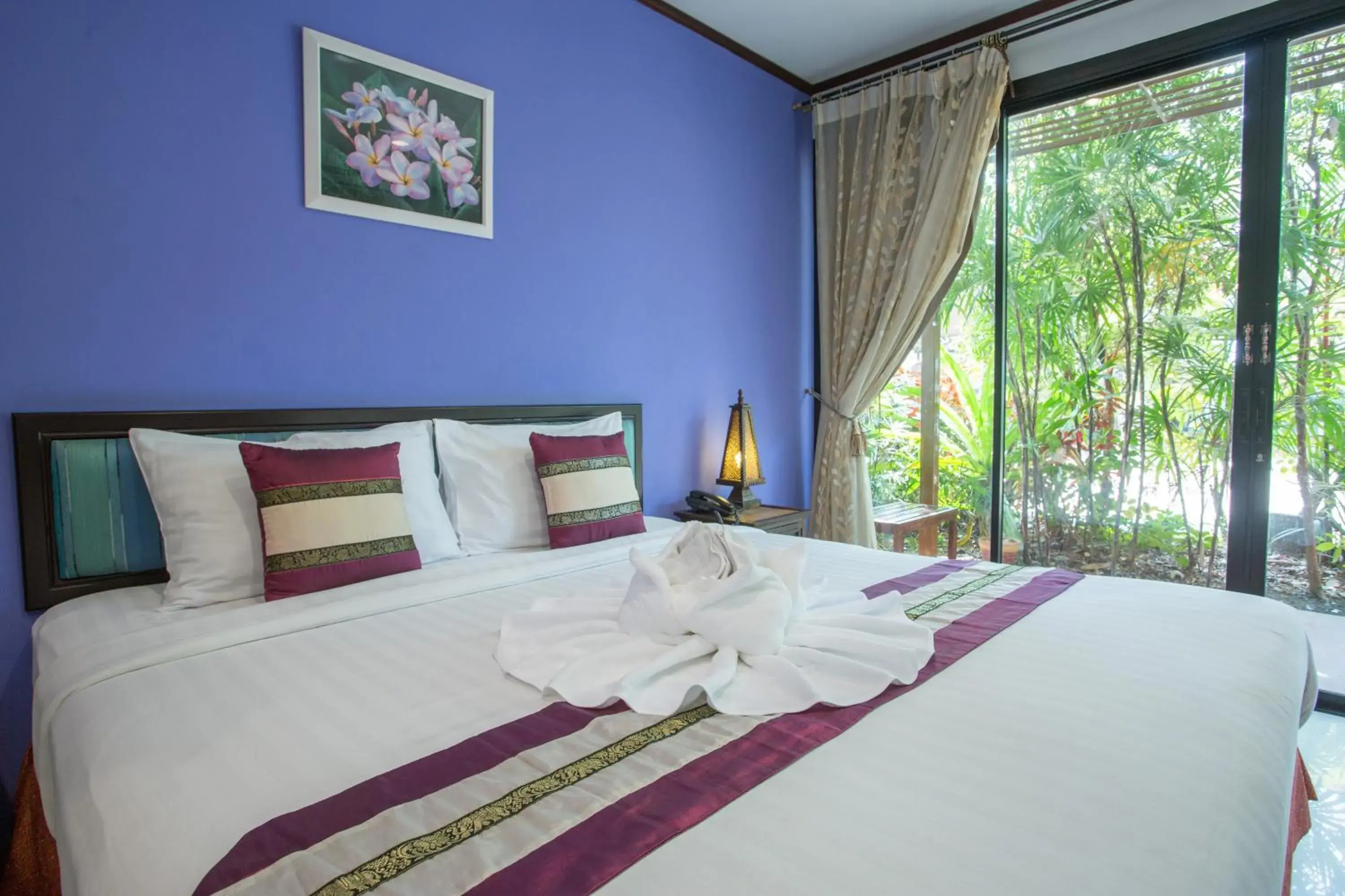 Bed in Ploy Khumthong Boutique Resort