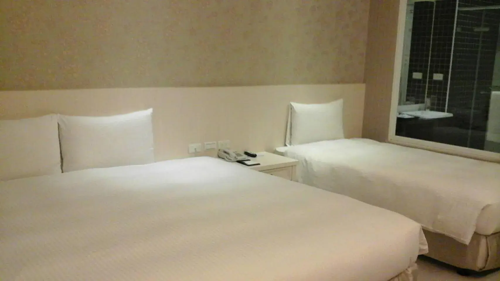 Bed in L'arc Hotel