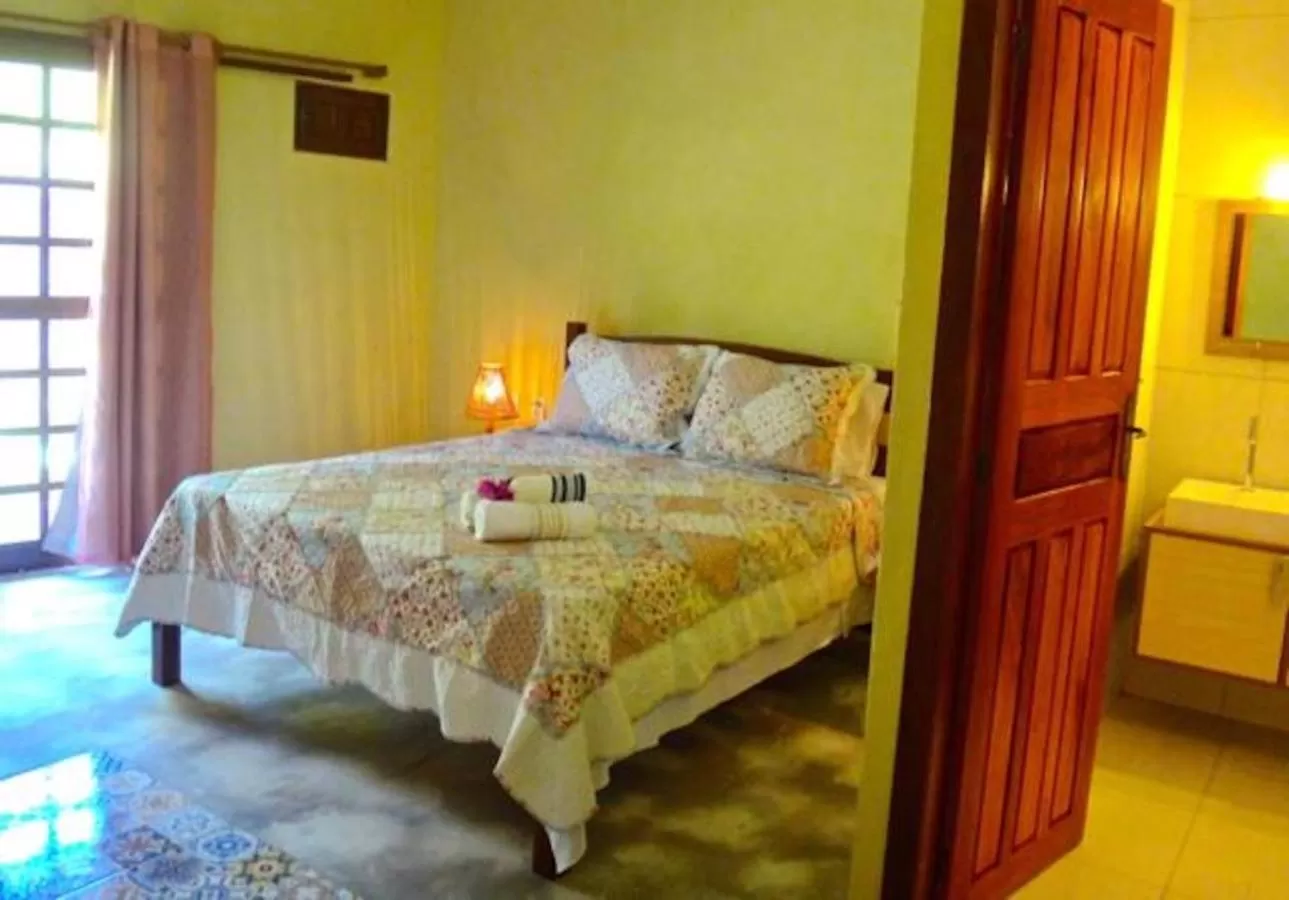 Bed in Pousada do Sonho