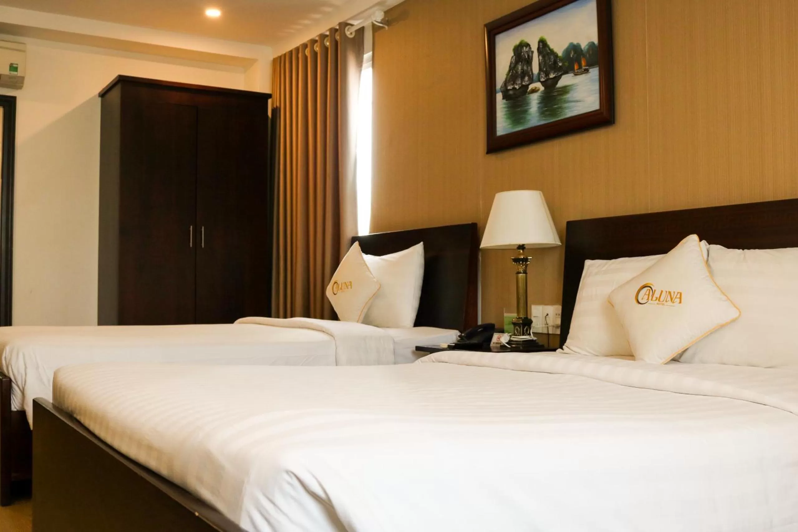 Bed in ALUNA Ben Thanh Hotel