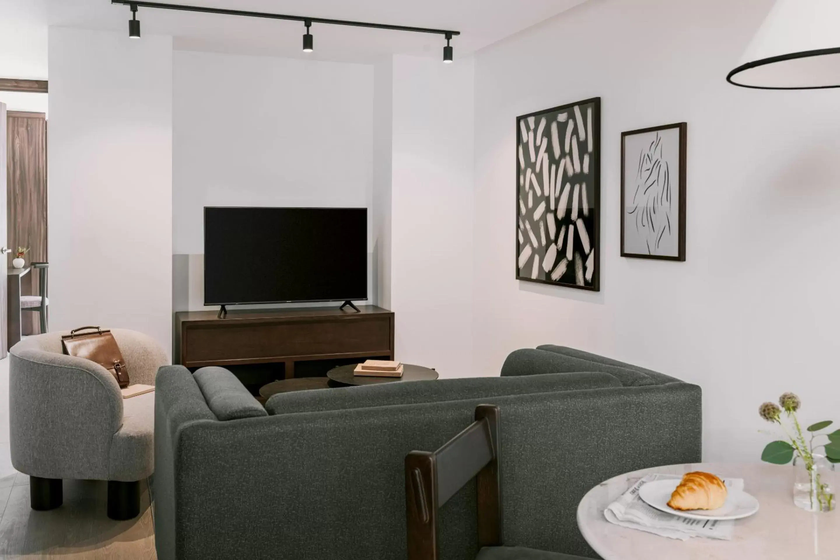 Living room, TV/Entertainment Center in Sonder Aria