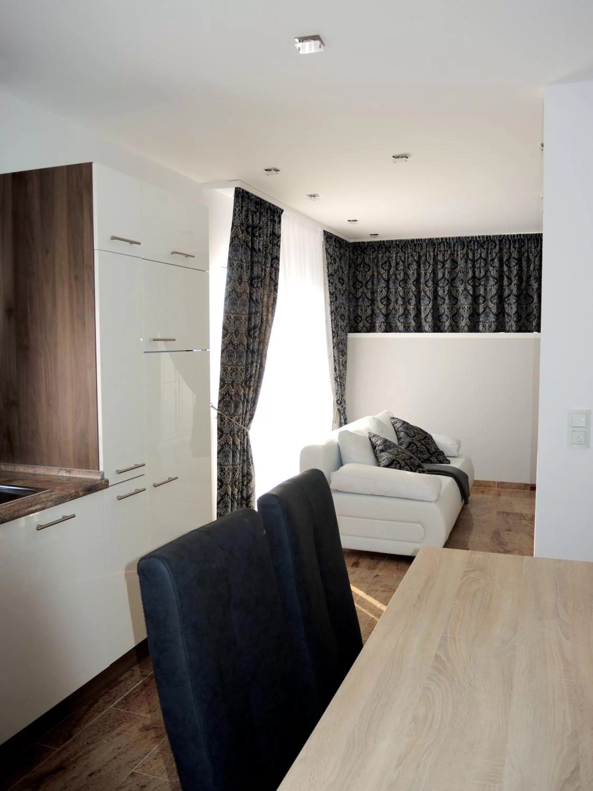 Seating area, Bed in Merkel Villa Apartamente