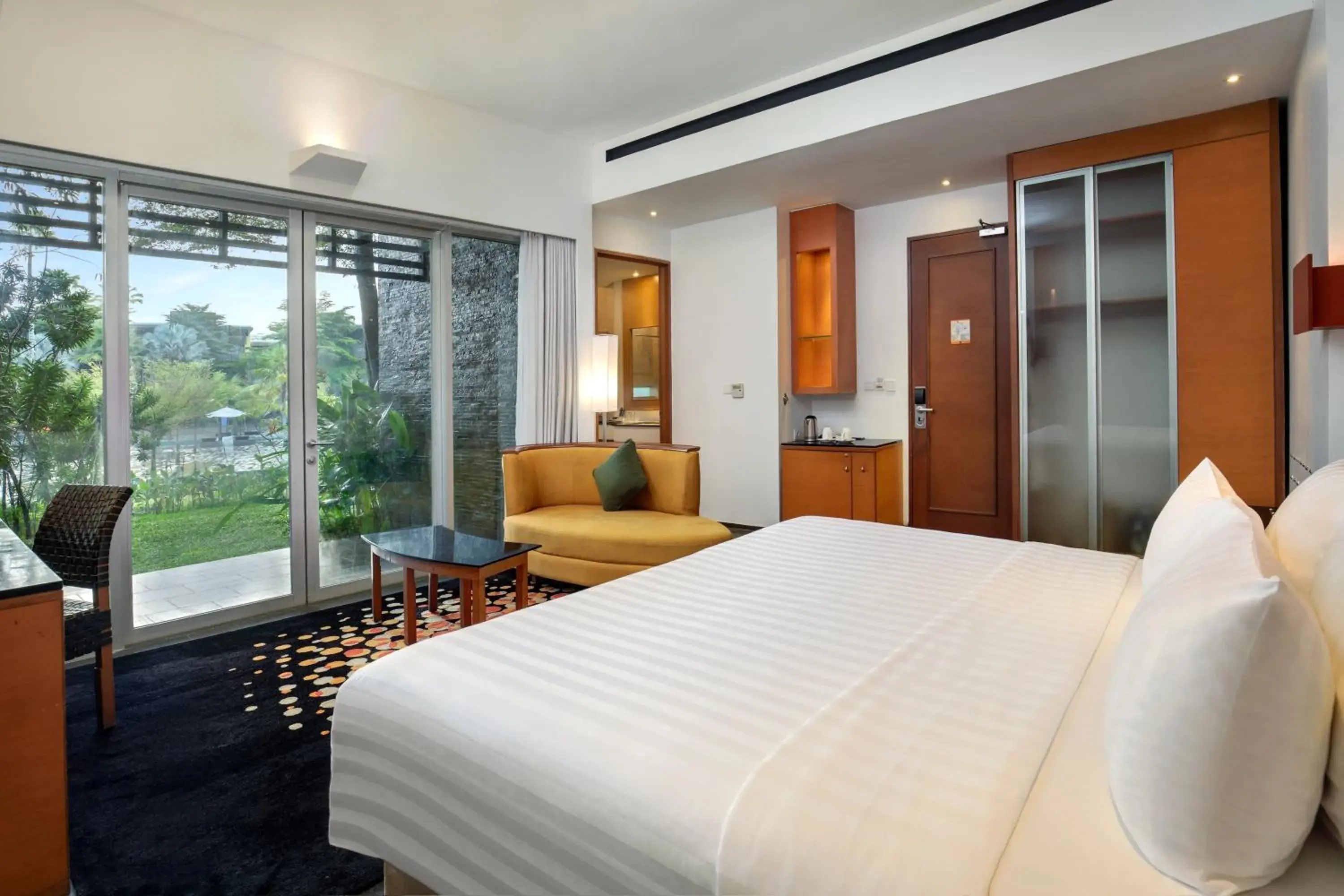 Photo of the whole room, Bed in Novotel Palembang Hotel