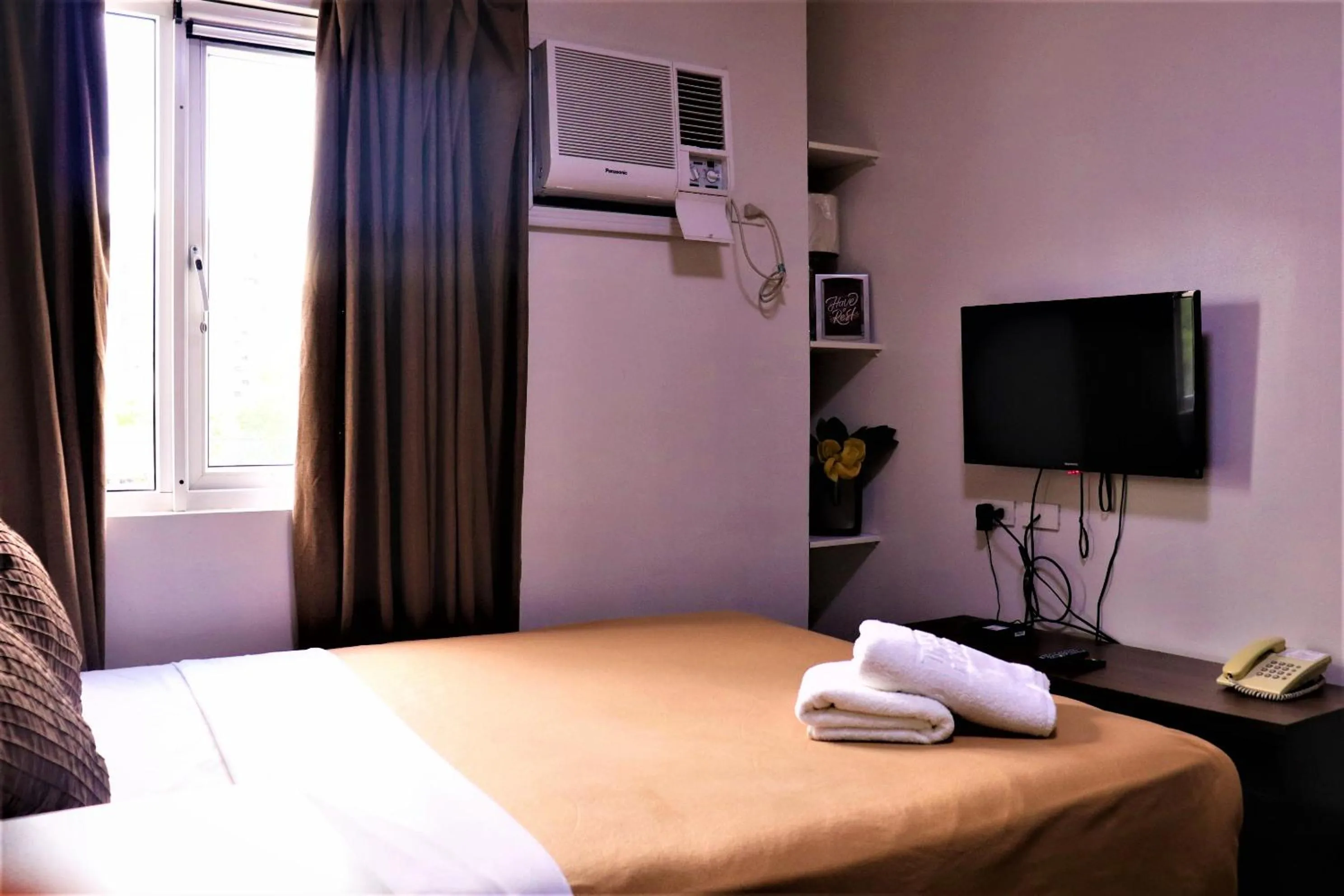 Bed in The Studio 18 Residences