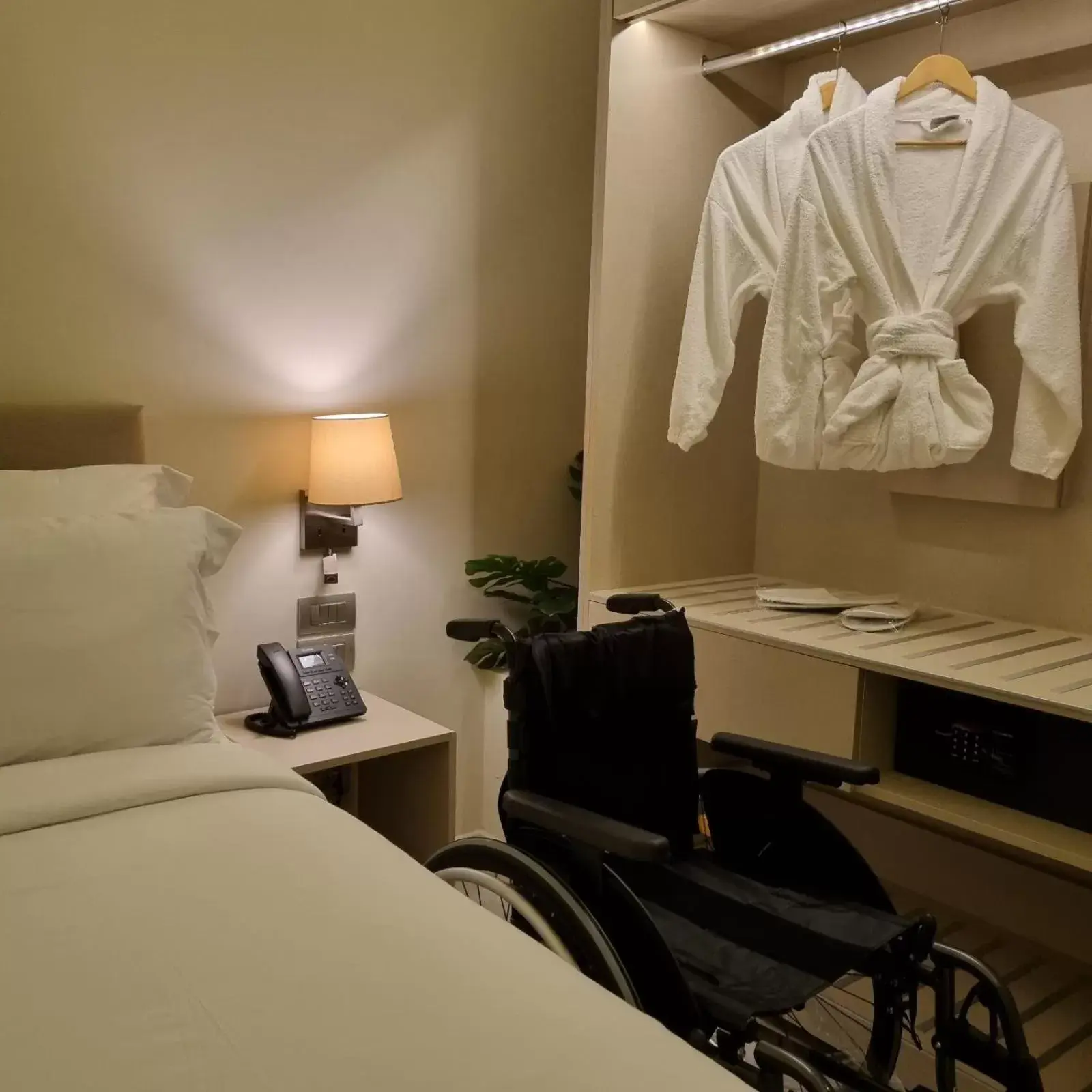 Facility for disabled guests, Bed in Green Suites Boutique Hotel