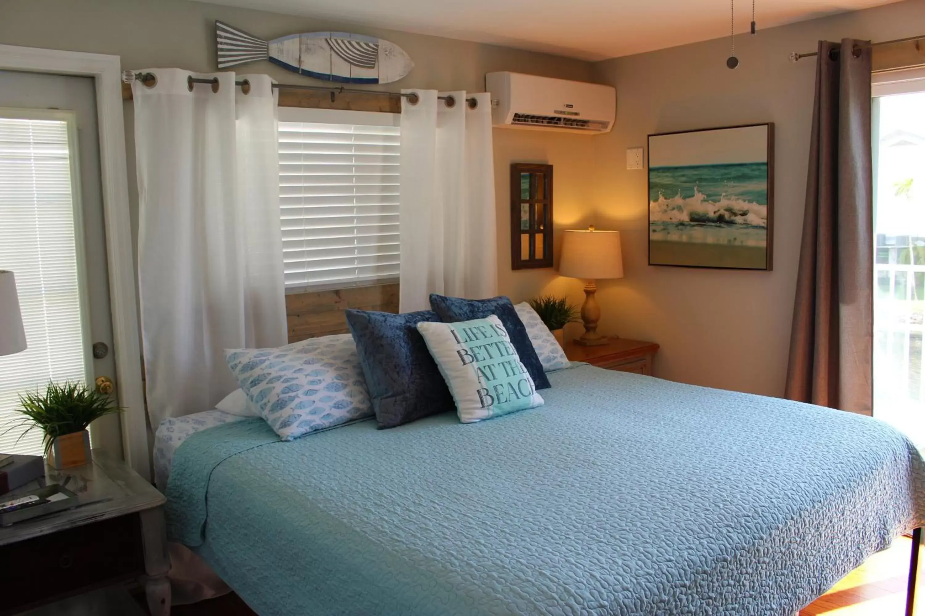 Bed in Latitude 26 Waterfront Boutique Resort - Bonita Springs