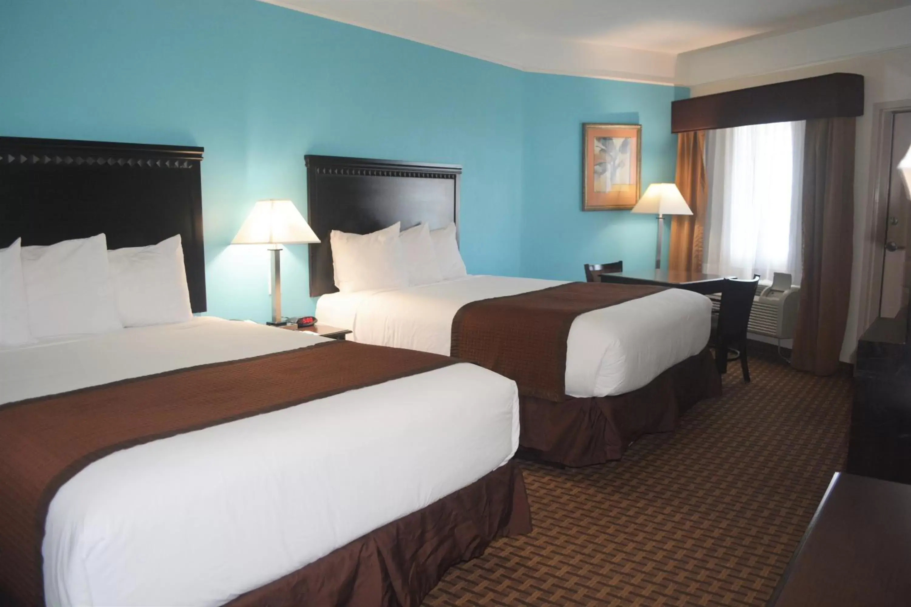 Photo of the whole room, Bed in Baymont by Wyndham Galveston