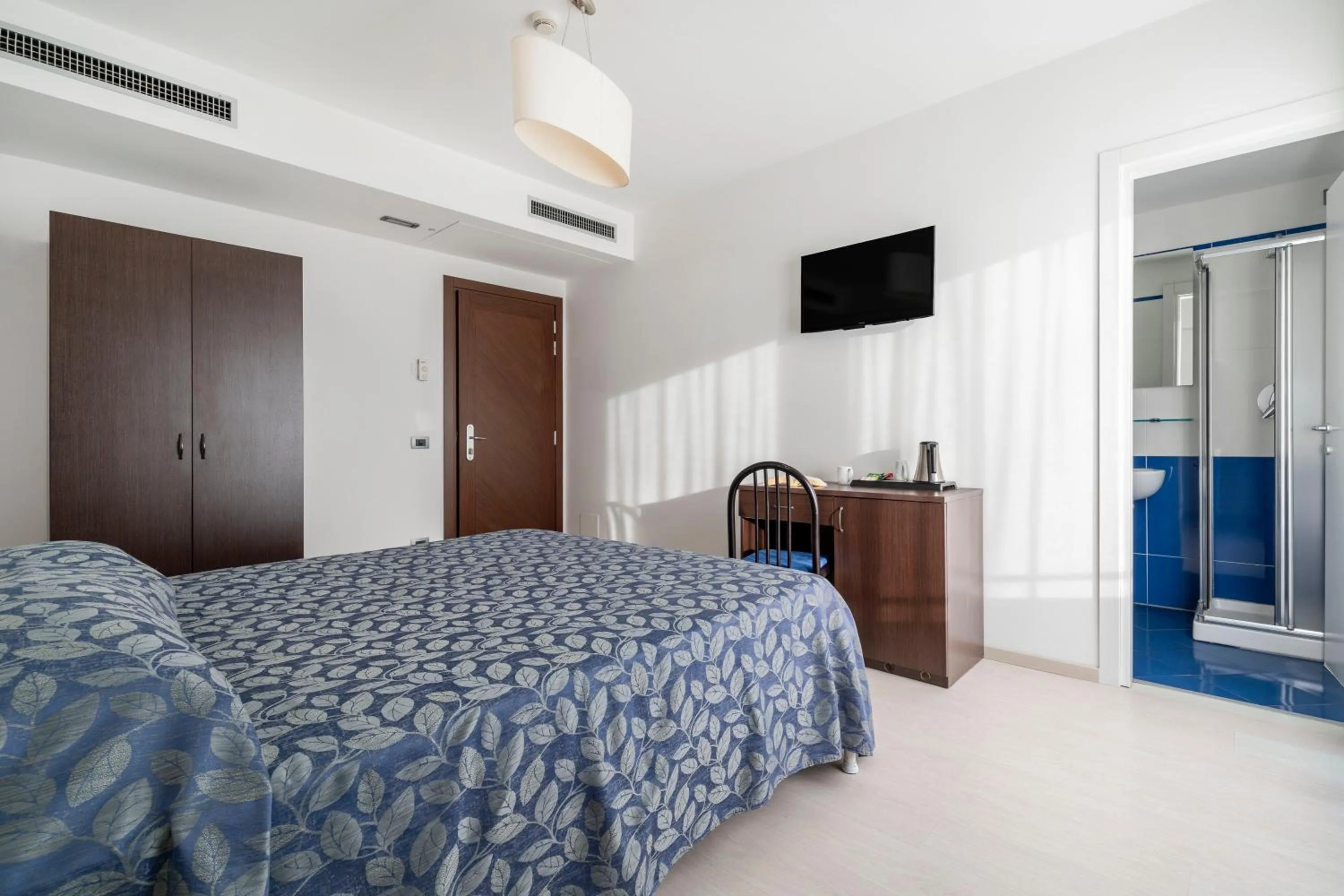 Bed in Hotel Sorriso