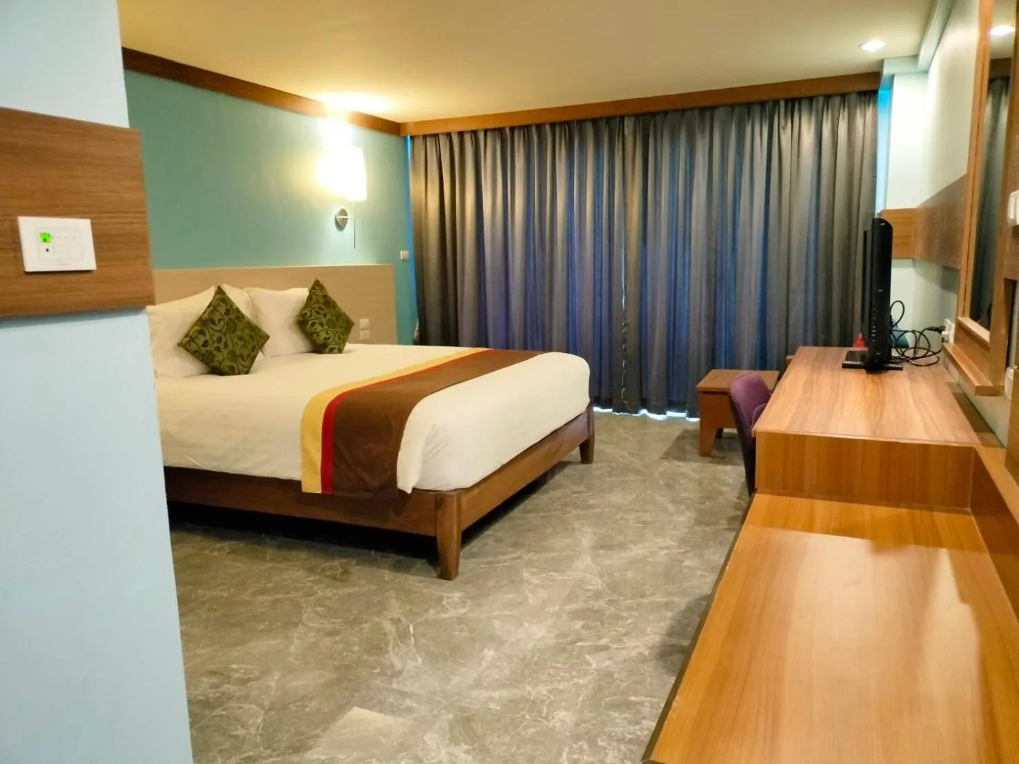 Bed in Saisawan Beach Luxury Hotel