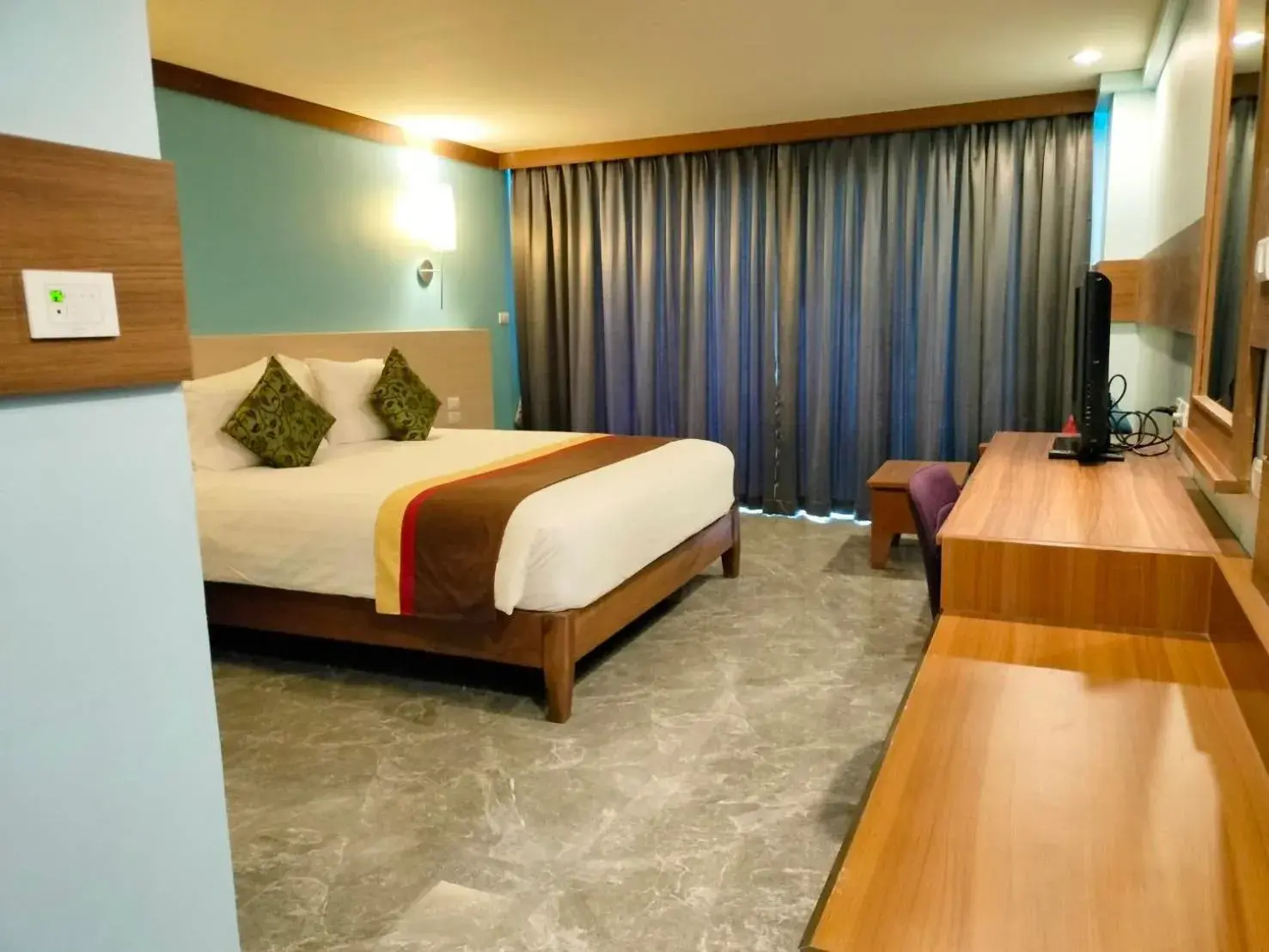 Bed in Saisawan Beach Resort