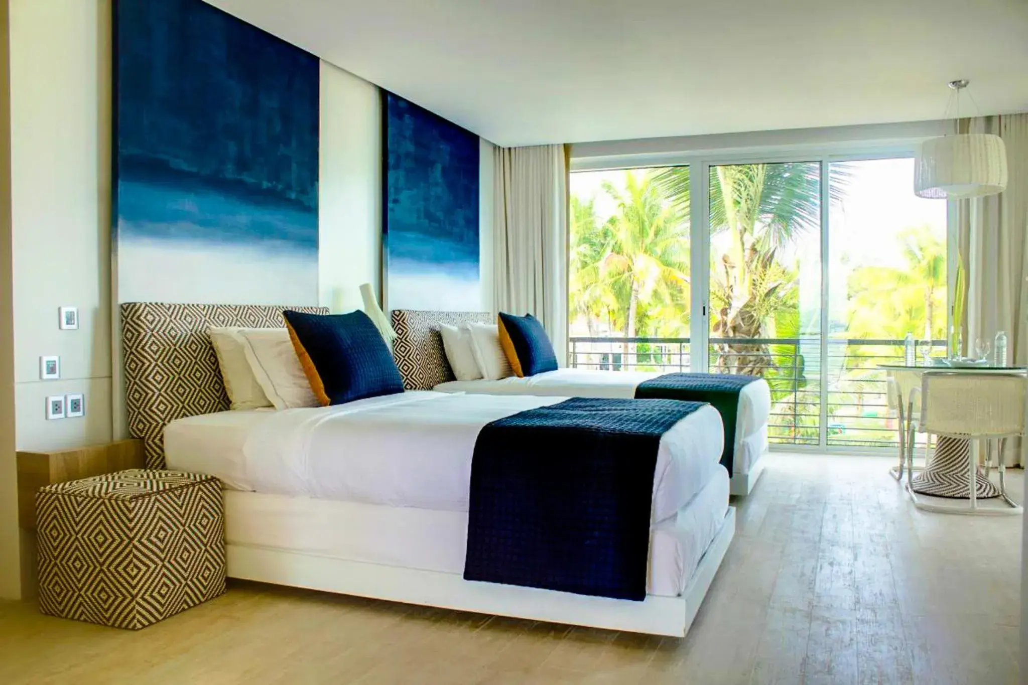 Bed, Seating Area in Misibis Bay