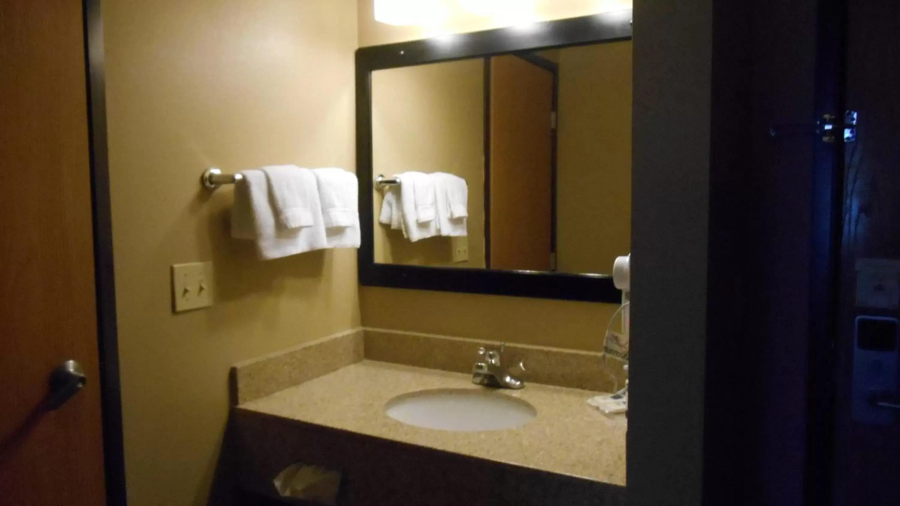 Bathroom in AmericInn by Wyndham Hartford WI